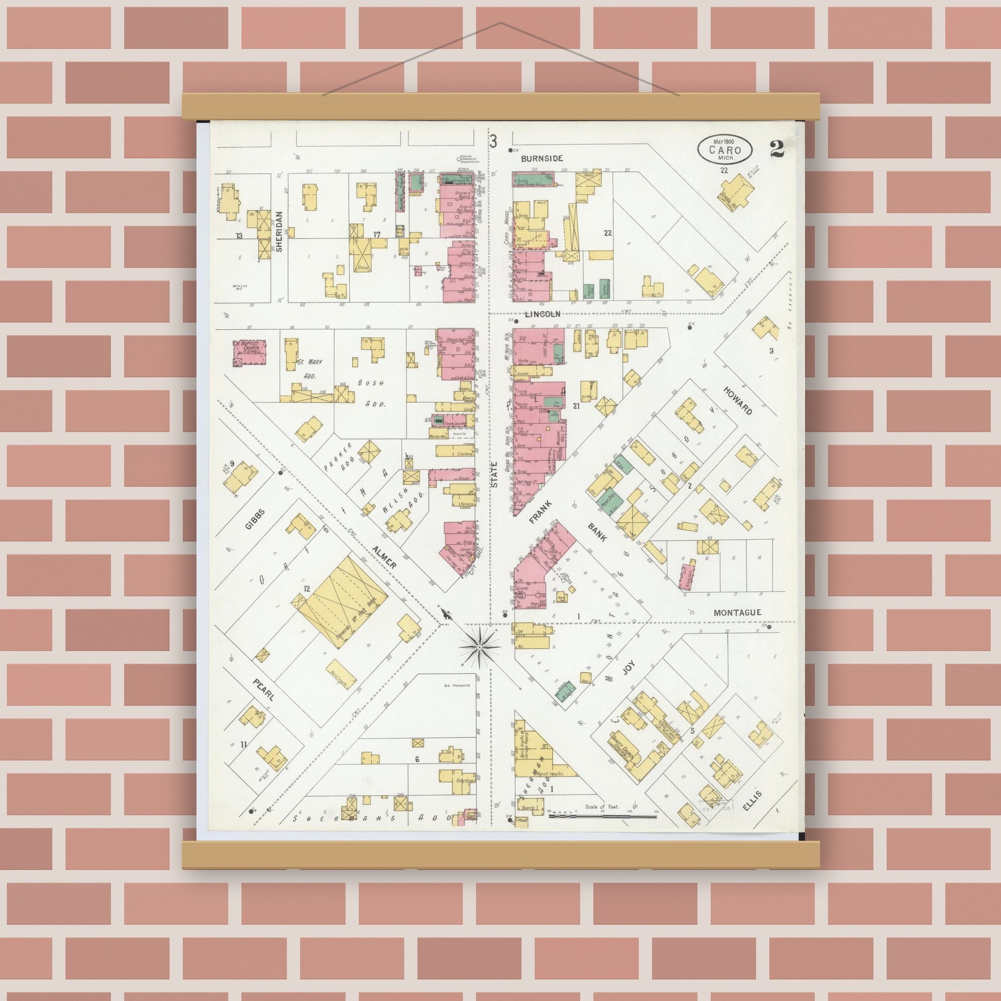Old map wall art mockup — magnetic wood frame on brick wall — Sanborn Fire Insurance Map from Caro, Tuscola County, Michigan (1900), Sheet #0002