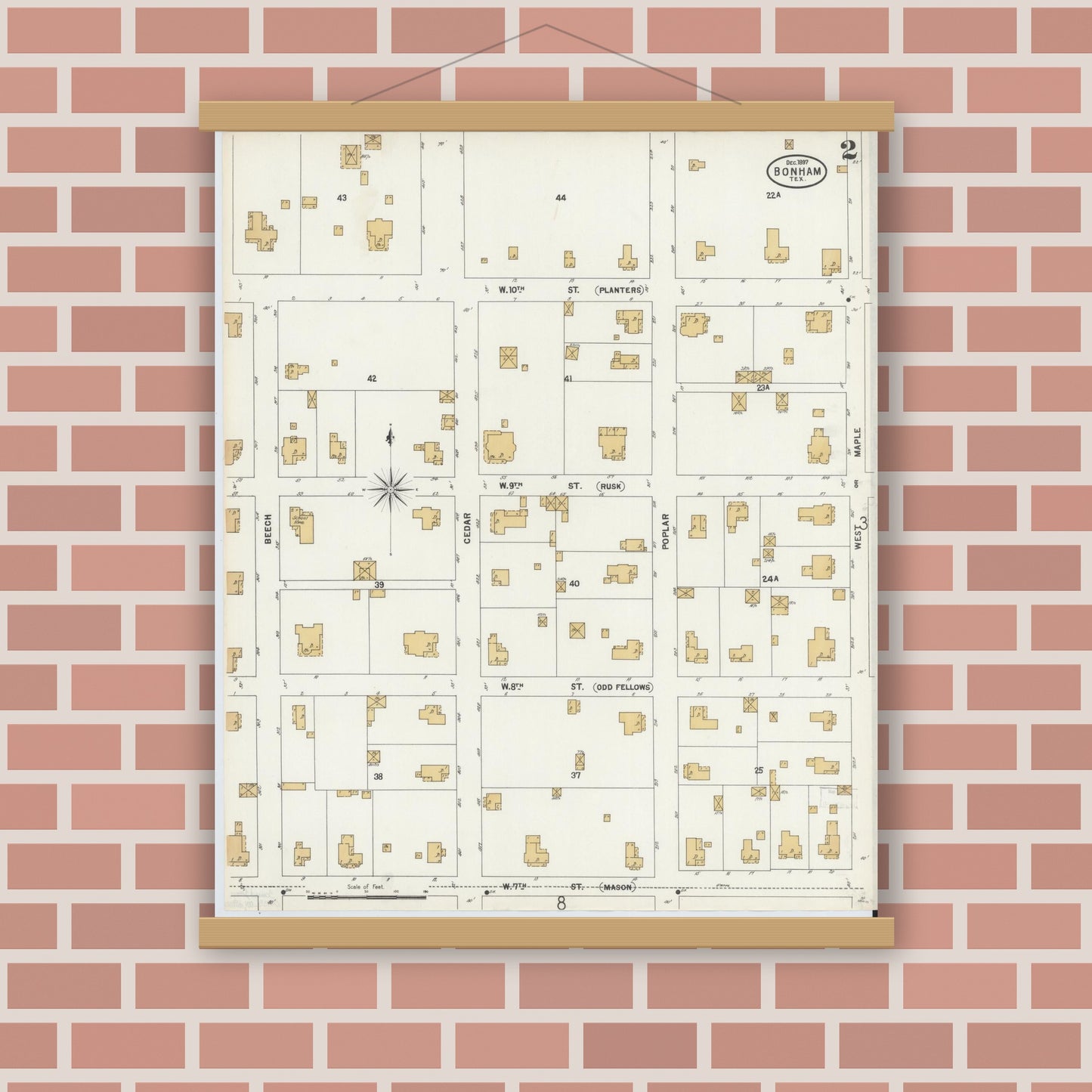 Old map wall art mockup — magnetic wood frame on brick wall — Sanborn Fire Insurance Map from Bonham, Fannin County, Texas (1897), Sheet #0002