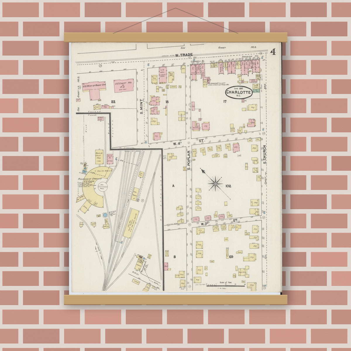 Old map wall art mockup — magnetic wood frame on brick wall — Sanborn Fire Insurance Map from Charlotte, Mecklenburg County, North Carolina (1890), Sheet #0004