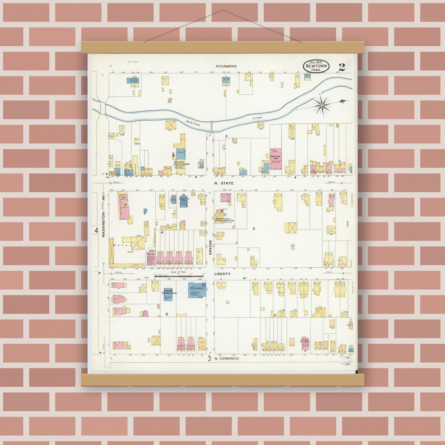 Old map wall art mockup — magnetic wood frame on brick wall — Sanborn Fire Insurance Map from Newtown, Bucks County, Pennsylvania (1909), Sheet #0002