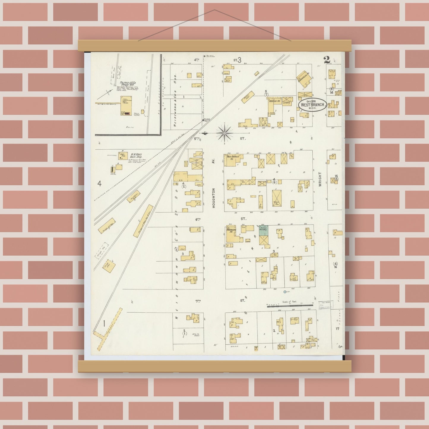 Old map wall art mockup — magnetic wood frame on brick wall — Sanborn Fire Insurance Map from West Branch, Ogemaw County, Michigan (1898), Sheet #0002
