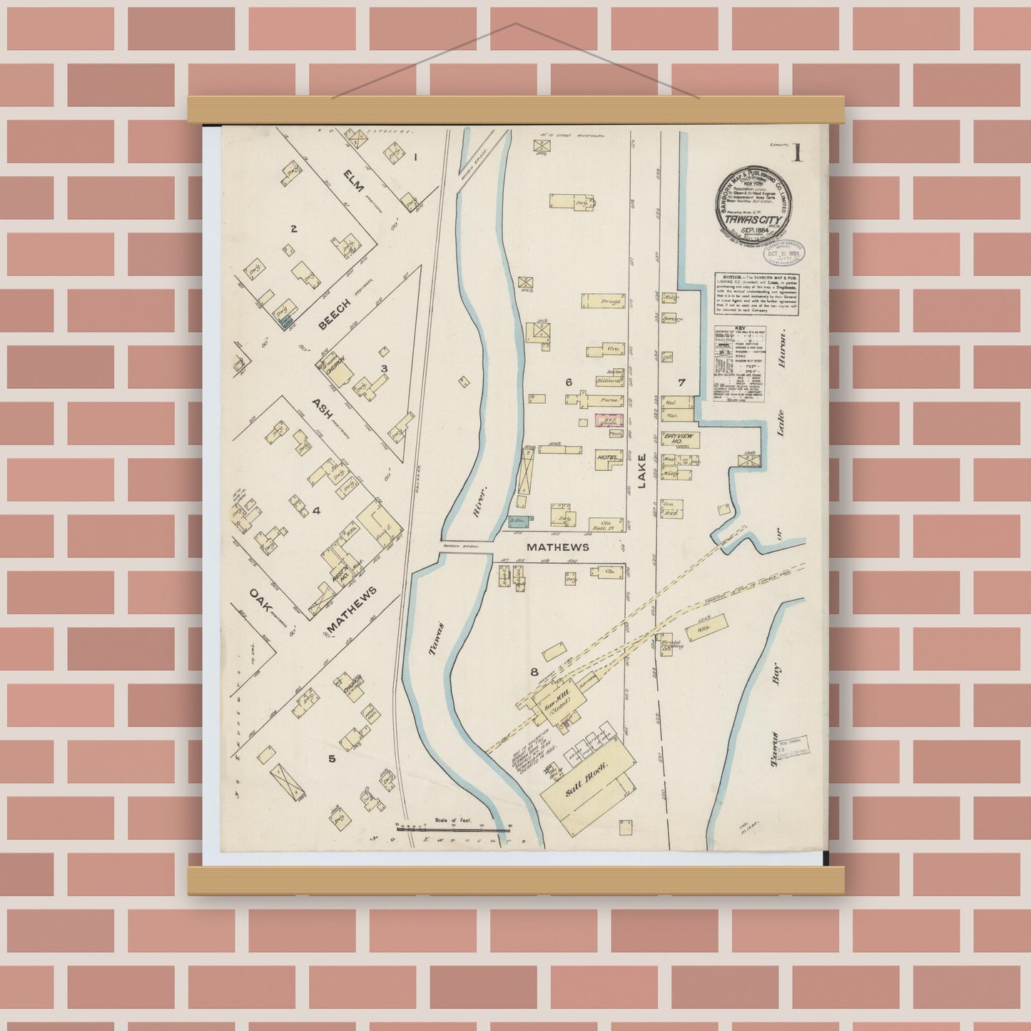 Old map wall art mockup — magnetic wood frame on brick wall — Sanborn Fire Insurance Map from Tawas City, Iosco County, Michigan (1884), Sheet #0001