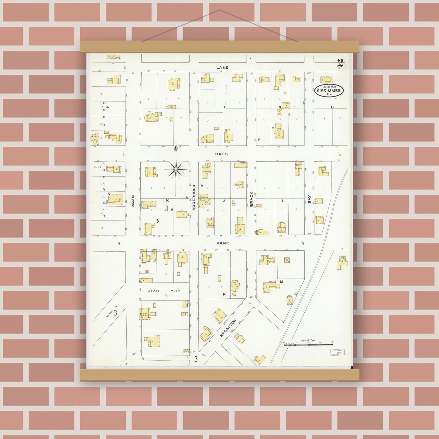 Old map wall art mockup — magnetic wood frame on brick wall — Sanborn Fire Insurance Map from Kissimmee, Osceola County, Florida (1909), Sheet #0002