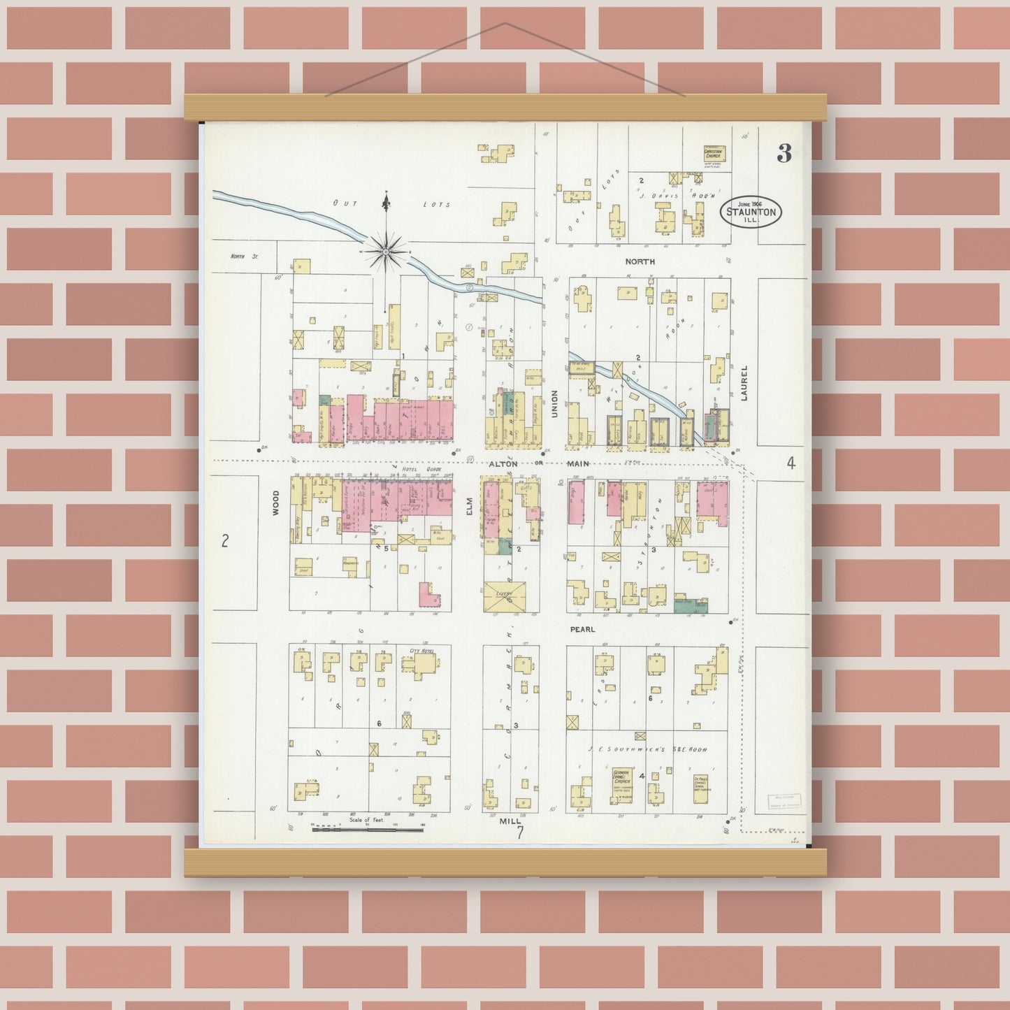 Old map wall art mockup — magnetic wood frame on brick wall — Sanborn Fire Insurance Map from Staunton, Macoupin County, Illinois (1906), Sheet #0003