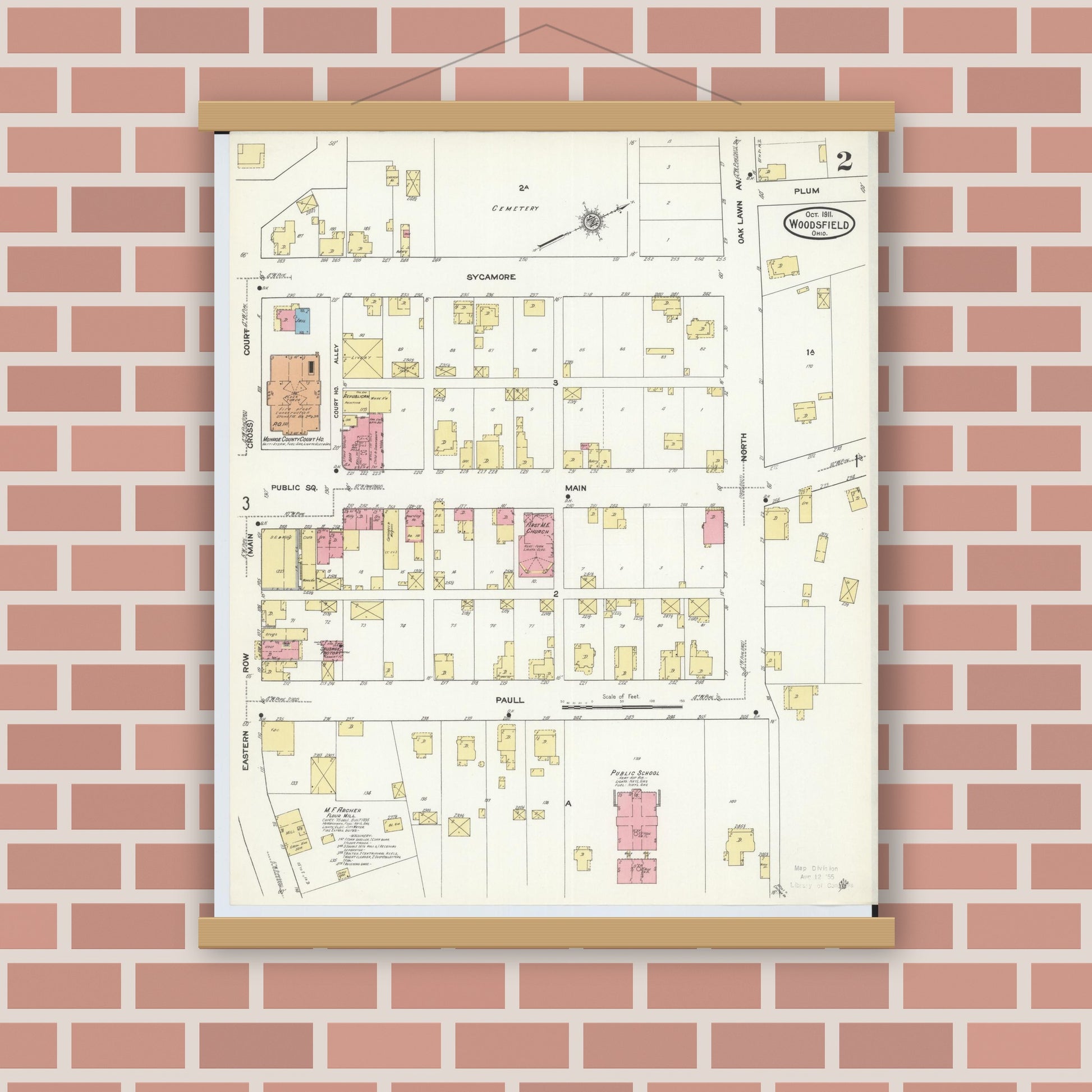 Old map wall art mockup — magnetic wood frame on brick wall — Sanborn Fire Insurance Map from Woodsfield, Monroe County, Ohio (1911), Sheet #0002