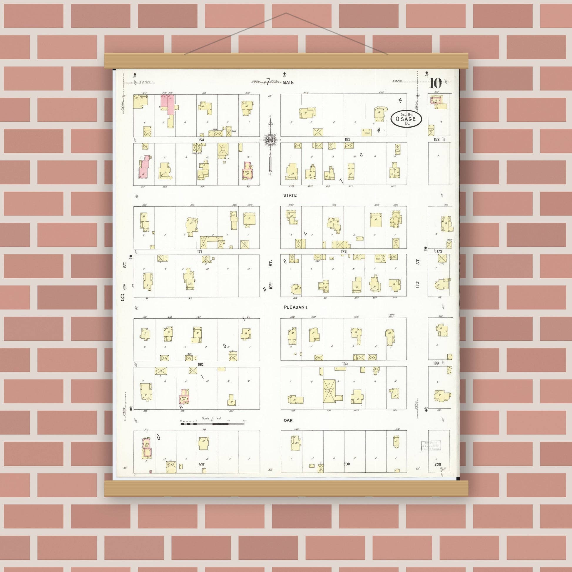 Old map wall art mockup — magnetic wood frame on brick wall — Sanborn Fire Insurance Map from Osage, Mitchell County, Iowa (1911), Sheet #0010
