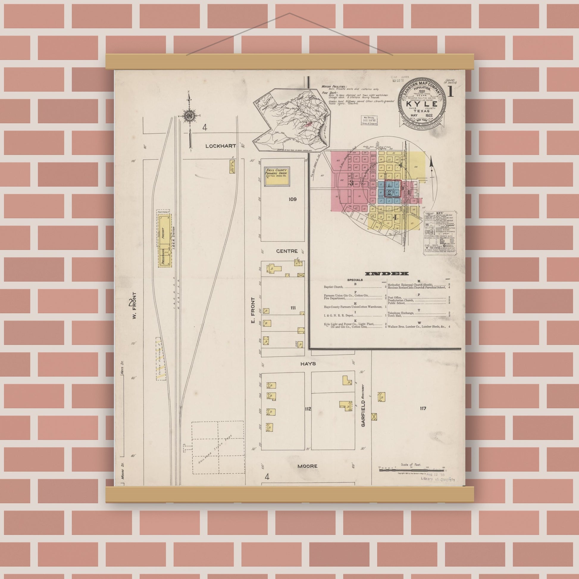 Old map wall art mockup — magnetic wood frame on brick wall — Sanborn Fire Insurance Map from Kyle, Hays County, Texas (1922), Sheet #0001