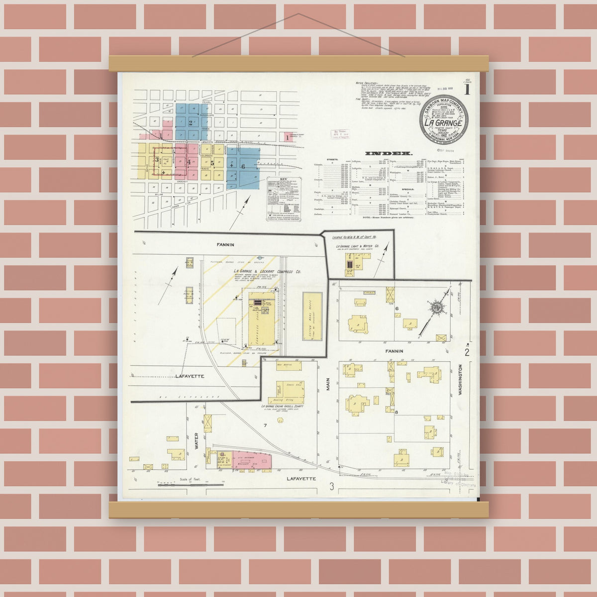 Old map wall art mockup — magnetic wood frame on brick wall — Sanborn Fire Insurance Map from La Grange, Fayette County, Texas (1912), Sheet #0001