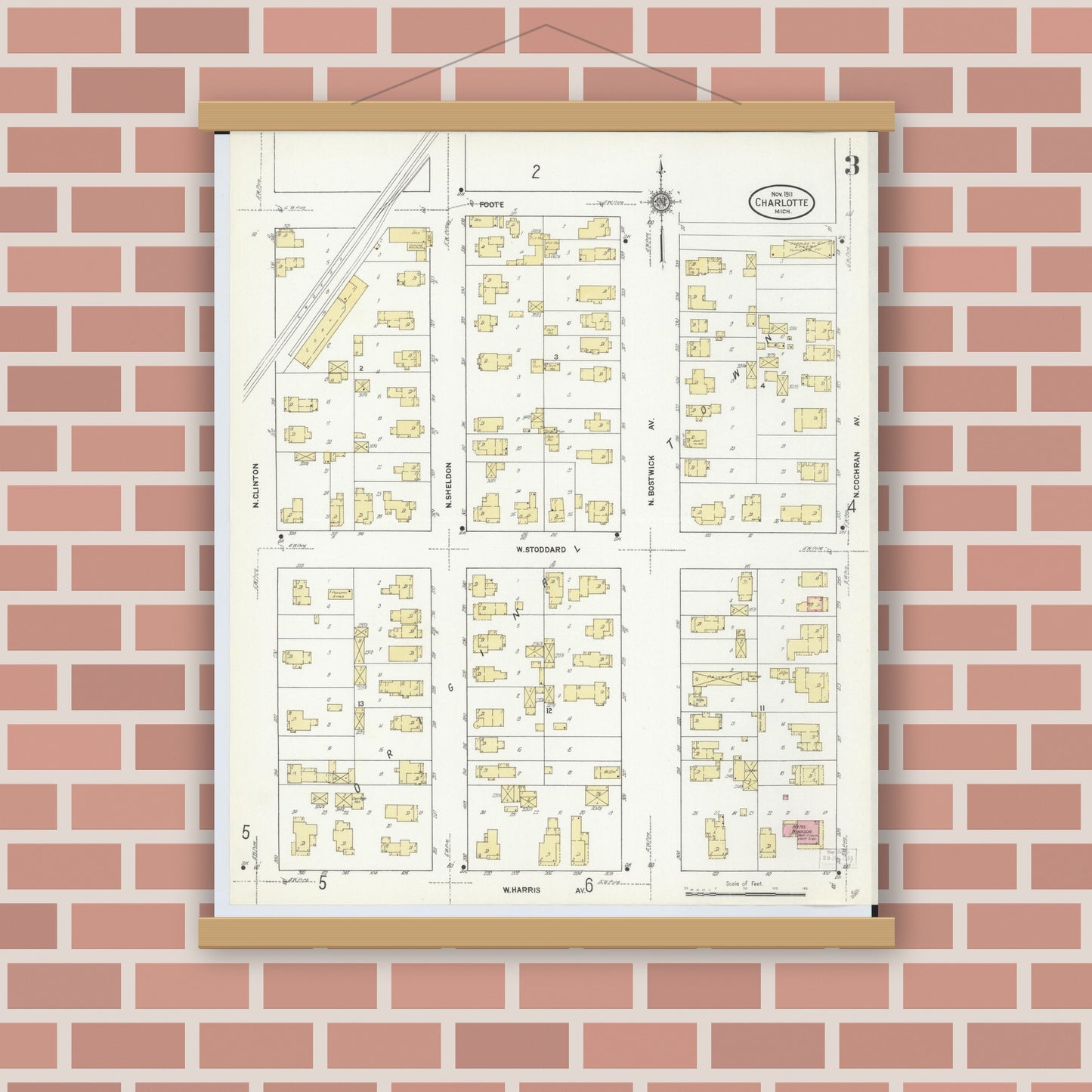 Old map wall art mockup — magnetic wood frame on brick wall — Sanborn Fire Insurance Map from Charlotte, Eaton County, Michigan (1911), Sheet #0003