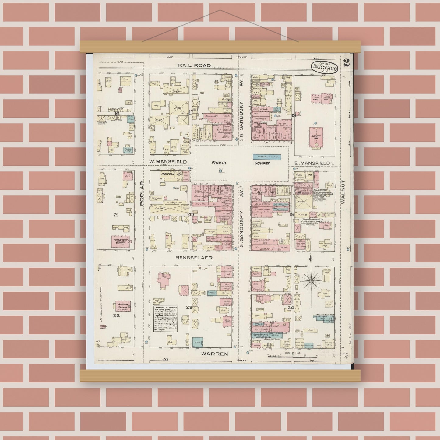 Old map wall art mockup — magnetic wood frame on brick wall — Sanborn Fire Insurance Map from Bucyrus, Crawford County, Ohio (1884), Sheet #0002