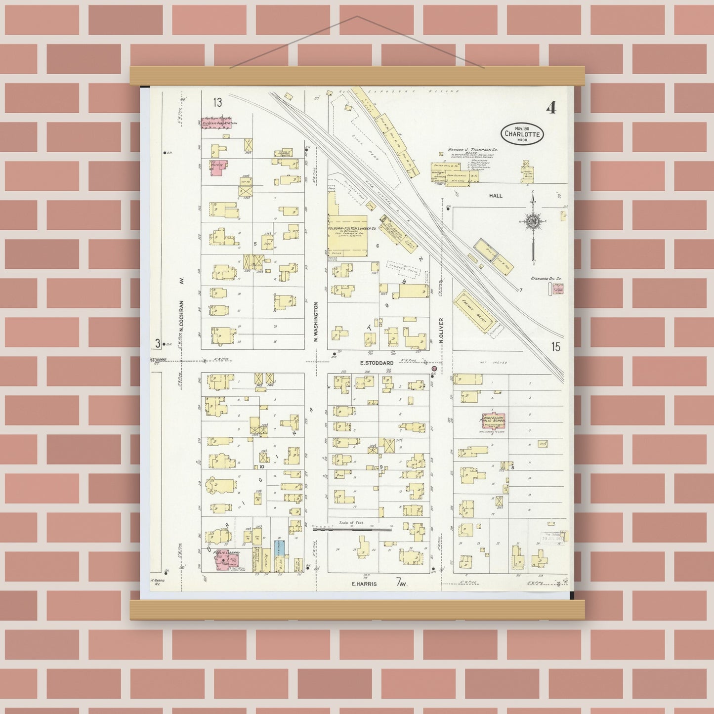 Old map wall art mockup — magnetic wood frame on brick wall — Sanborn Fire Insurance Map from Charlotte, Eaton County, Michigan (1911), Sheet #0004