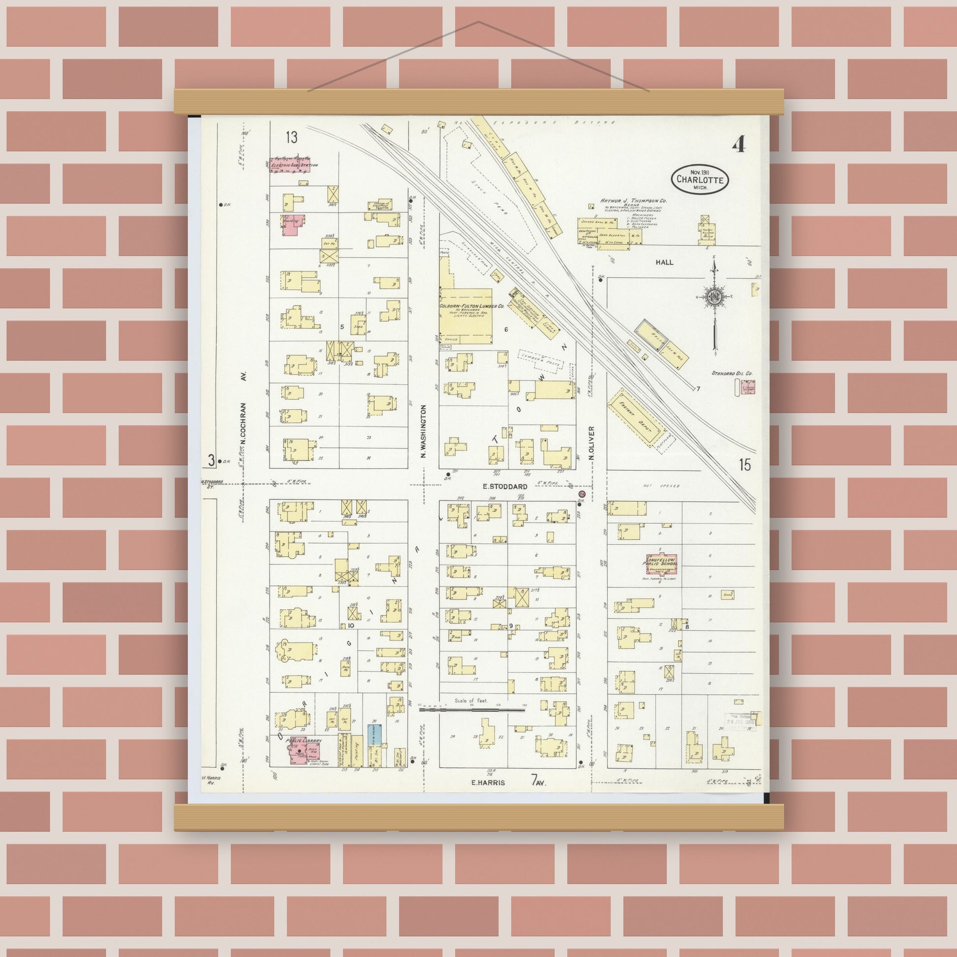 Old map wall art mockup — magnetic wood frame on brick wall — Sanborn Fire Insurance Map from Charlotte, Eaton County, Michigan (1911), Sheet #0004