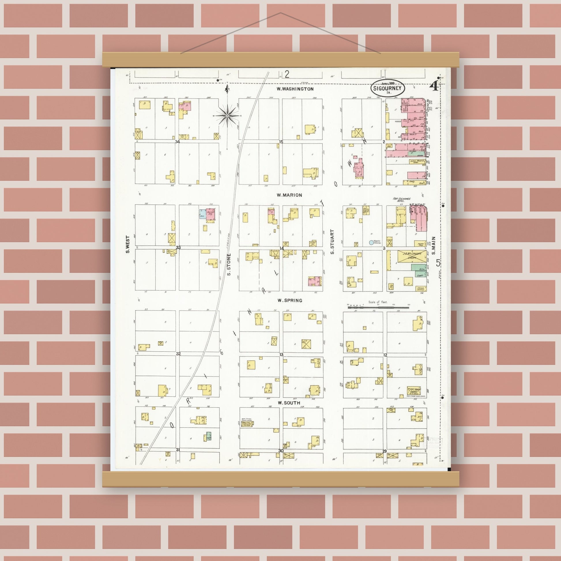 Old map wall art mockup — magnetic wood frame on brick wall — Sanborn Fire Insurance Map from Sigourney, Kiokuk County, Iowa (1899), Sheet #0004