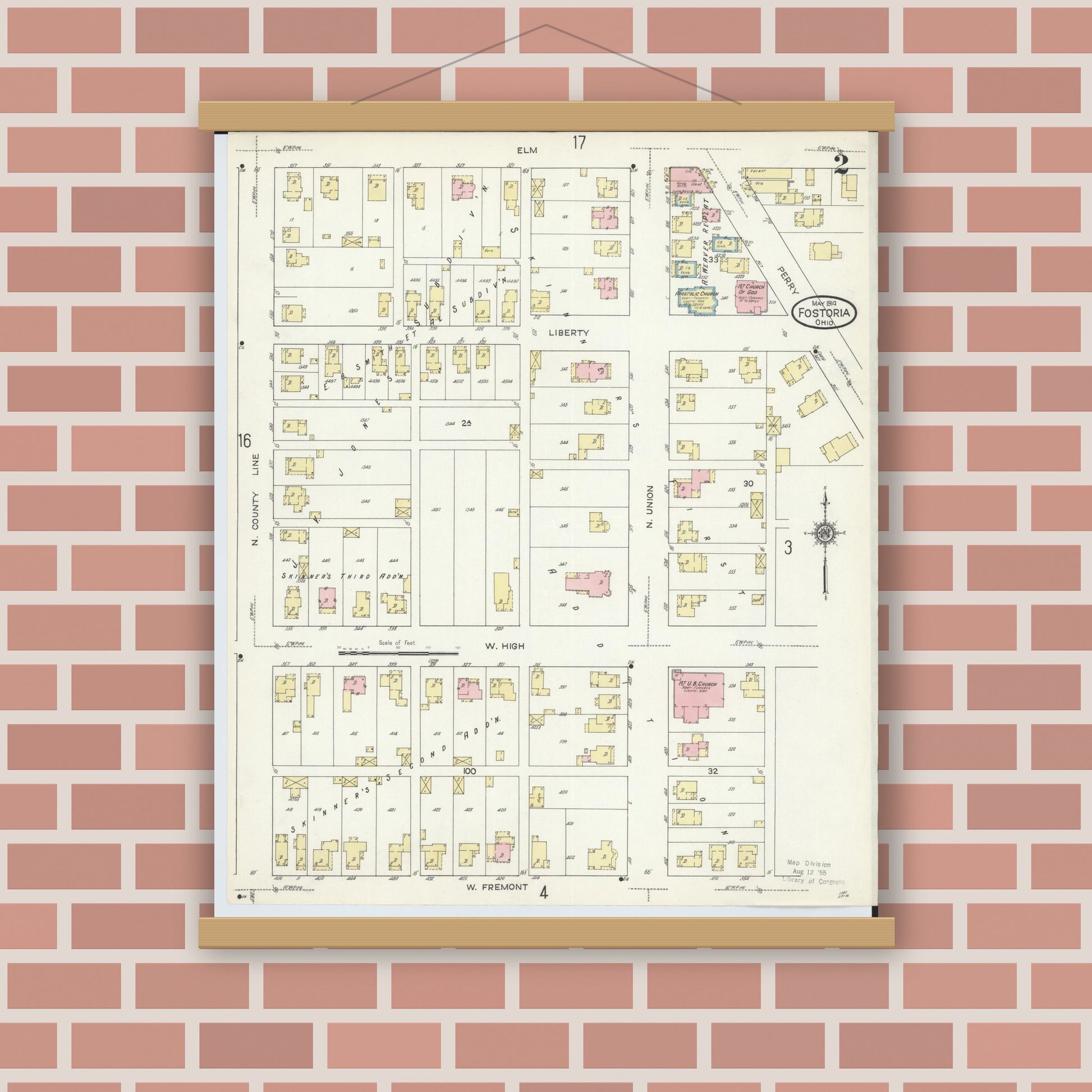 Old map wall art mockup — magnetic wood frame on brick wall — Sanborn Fire Insurance Map from Fostoria, Seneca, Hancock, And Wood Counties, Ohio (1914), Sheet #0002
