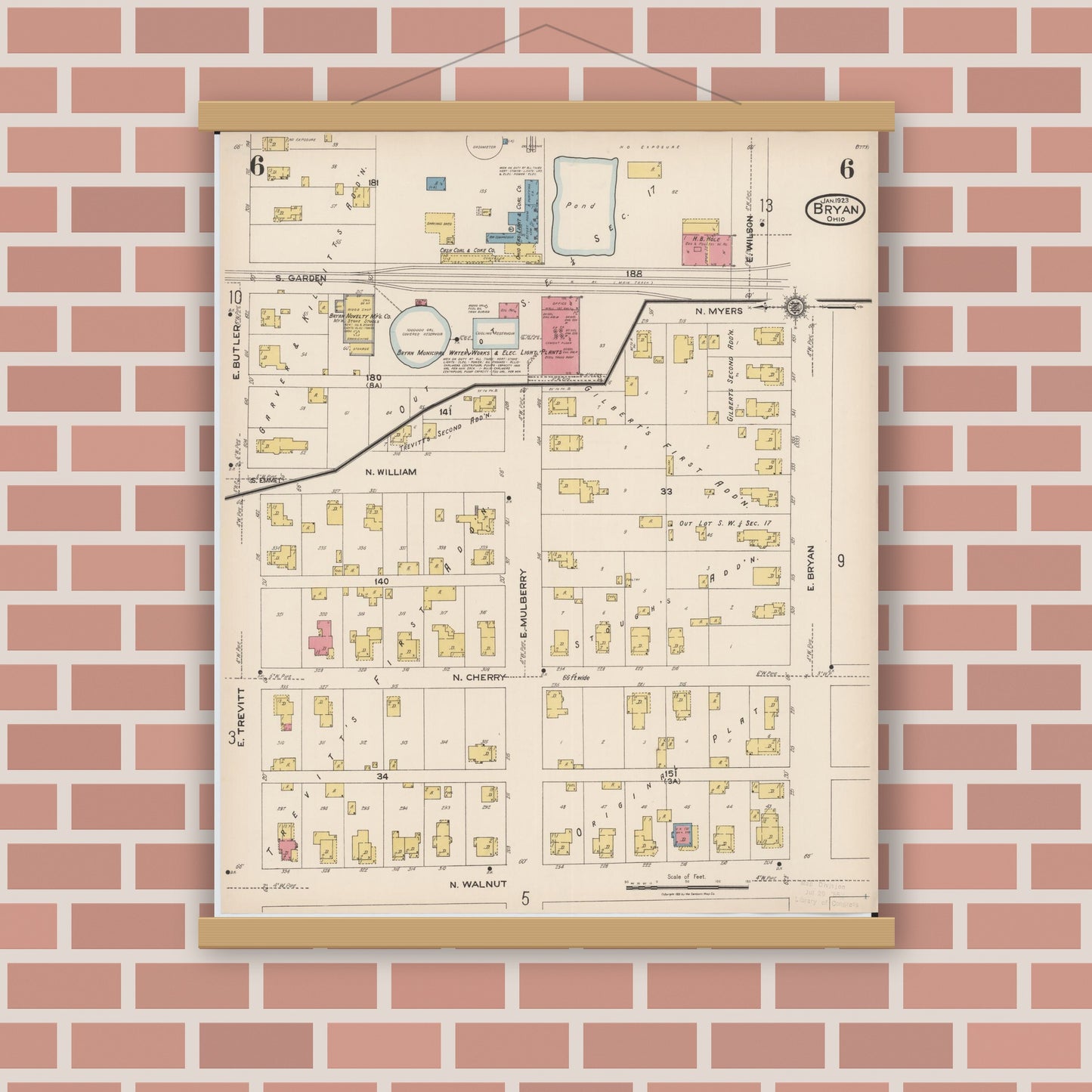 Old map wall art mockup — magnetic wood frame on brick wall — Sanborn Fire Insurance Map from Bryan, Williams County, Ohio (1923), Sheet #0006