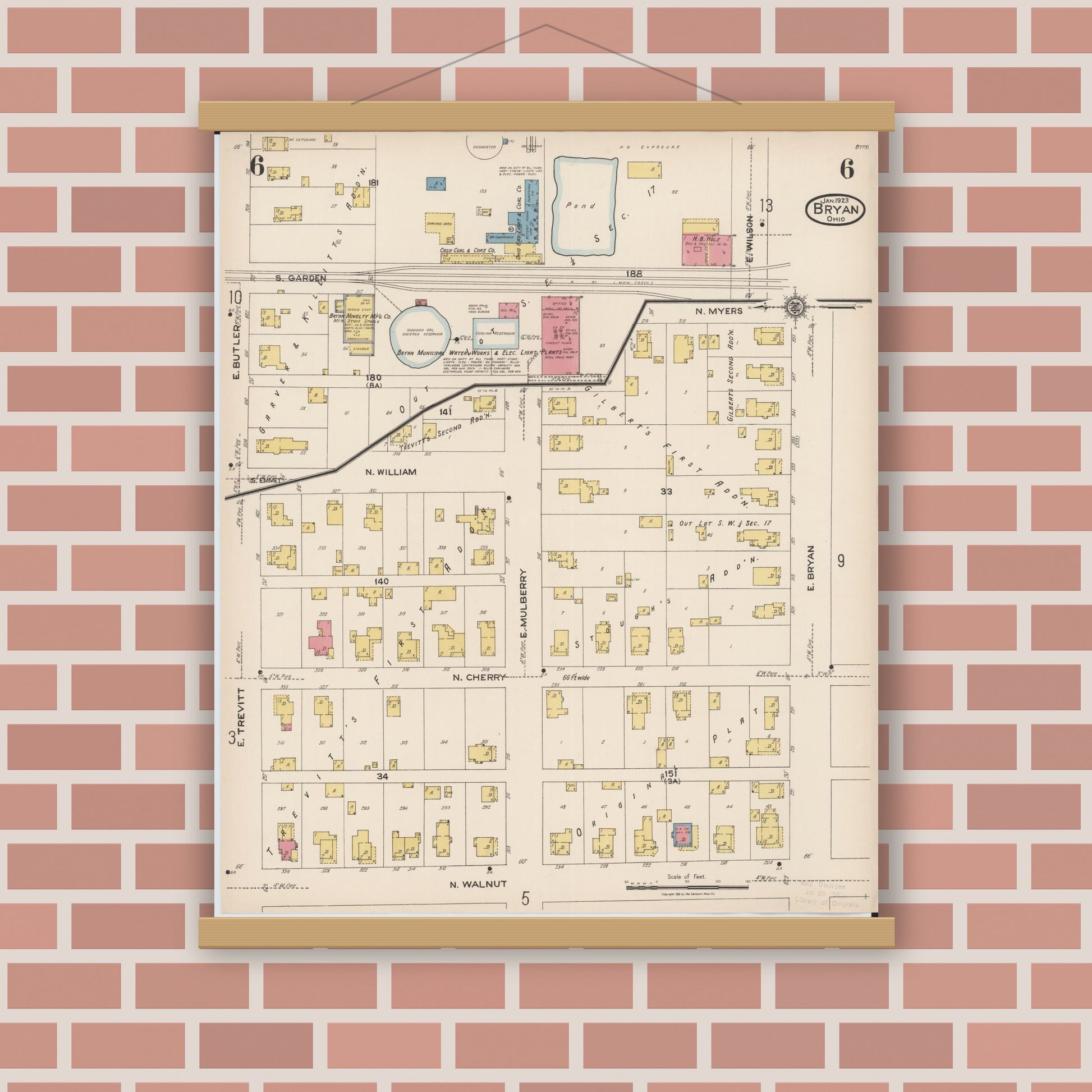Old map wall art mockup — magnetic wood frame on brick wall — Sanborn Fire Insurance Map from Bryan, Williams County, Ohio (1923), Sheet #0006