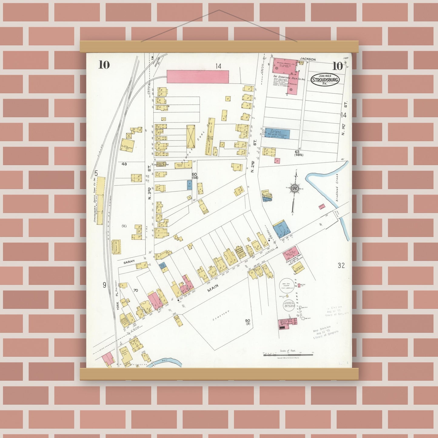 Old map wall art mockup — magnetic wood frame on brick wall — Sanborn Fire Insurance Map from Stroudsburg, Monroe County, Pennsylvania (1923), Sheet #0010