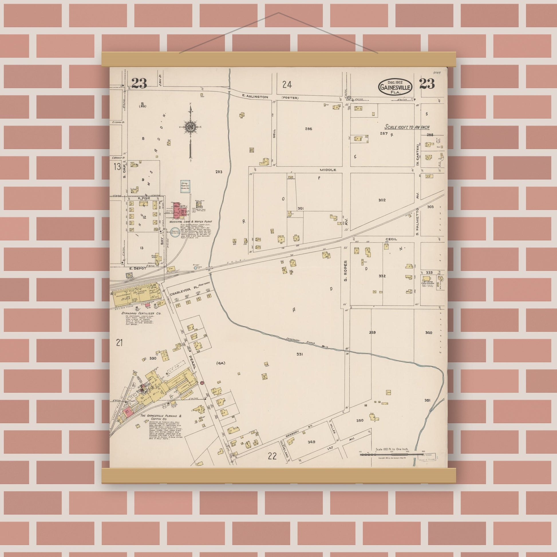 Old map wall art mockup — magnetic wood frame on brick wall — Sanborn Fire Insurance Map from Gainesville, Alachua County, Florida (1922), Sheet #0023