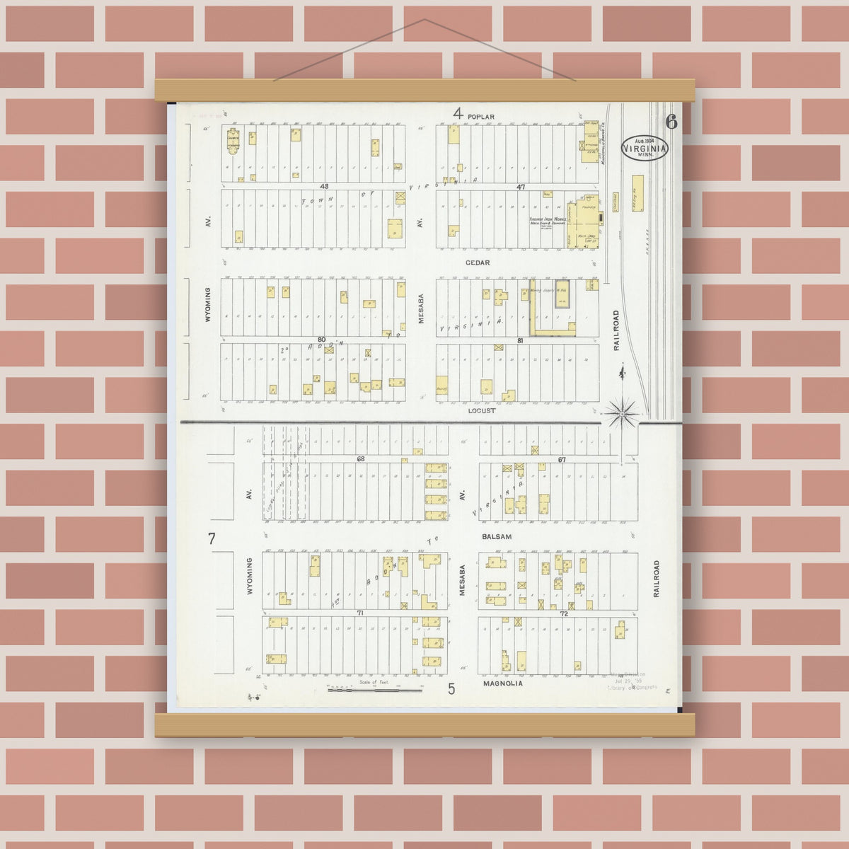 Old map wall art mockup — magnetic wood frame on brick wall — Sanborn Fire Insurance Map from Virginia, Saint Louis County, Minnesota (1904), Sheet #0006