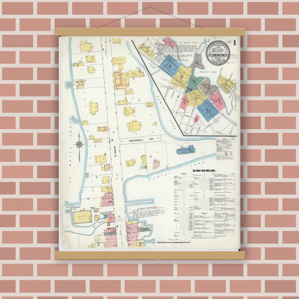Old map wall art mockup — magnetic wood frame on brick wall — Sanborn Fire Insurance Map from Oconomowoc, Waukesha County, Wisconsin (1909) - Complete Map Set