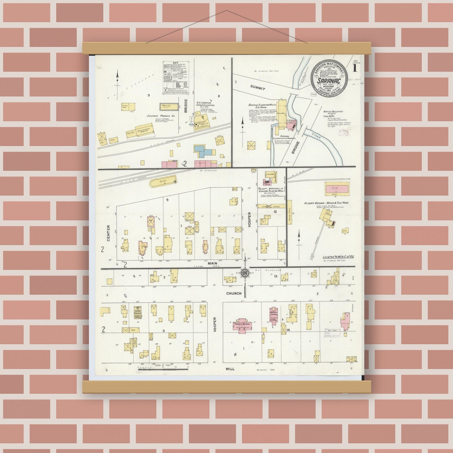 Old map wall art mockup — magnetic wood frame on brick wall — Sanborn Fire Insurance Map from Saranac, Ionia County, Michigan (1911) - Complete Map Set