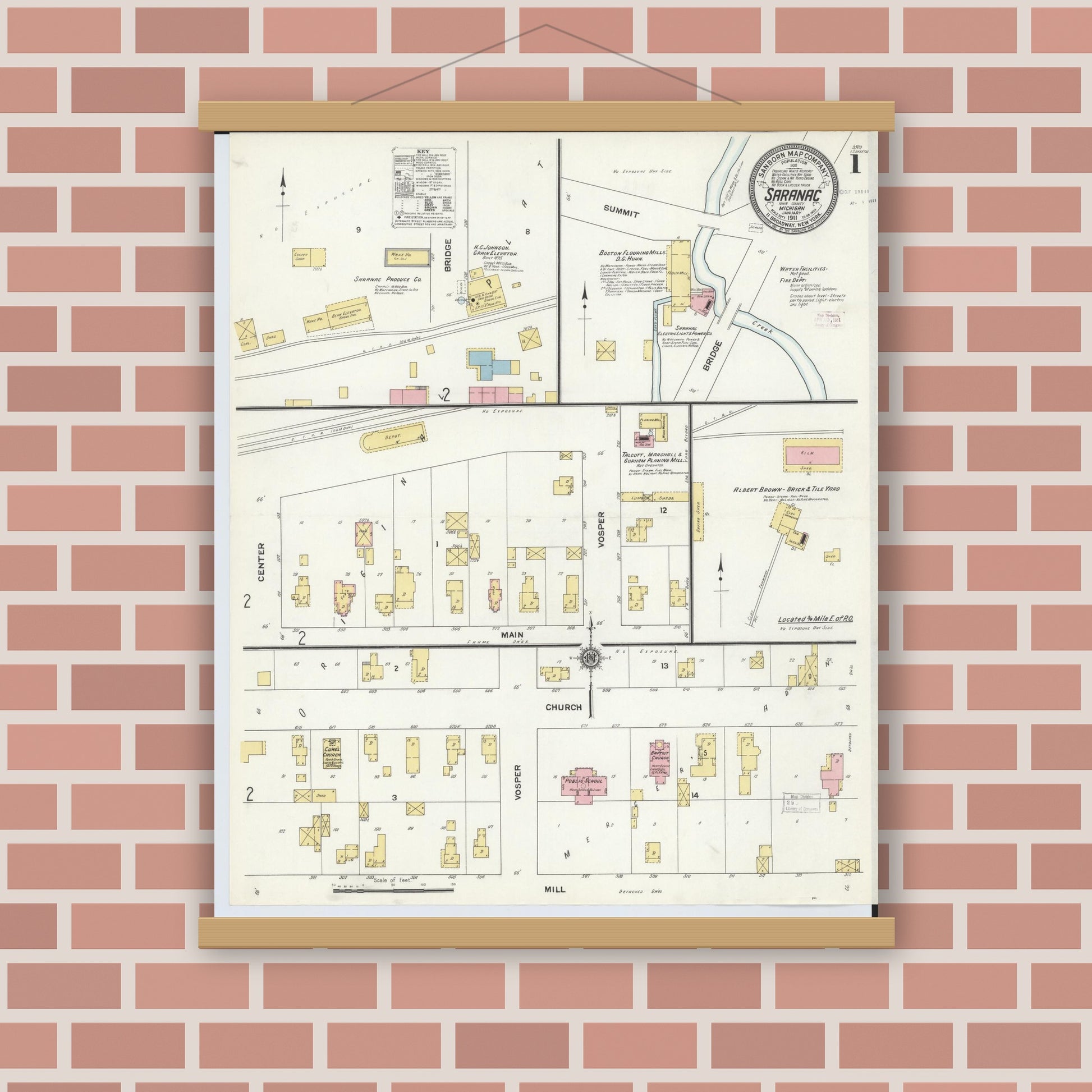 Old map wall art mockup — magnetic wood frame on brick wall — Sanborn Fire Insurance Map from Saranac, Ionia County, Michigan (1911) - Complete Map Set