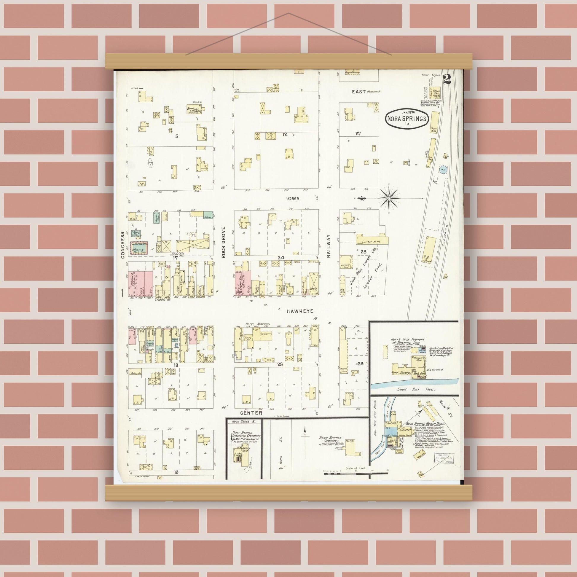 Old map wall art mockup — magnetic wood frame on brick wall — Sanborn Fire Insurance Map from Nora Springs, Floyd County, Iowa (1896), Sheet #0002