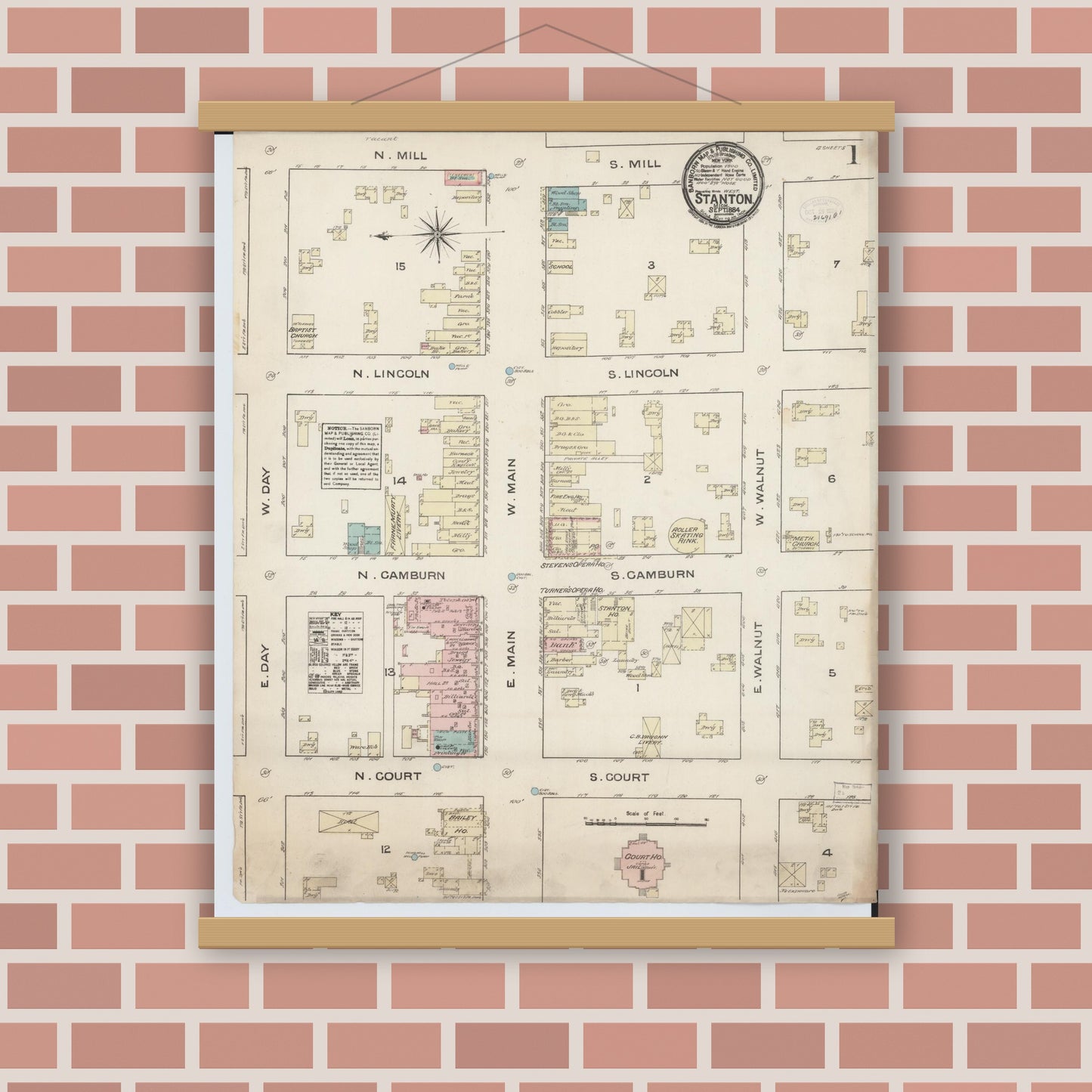 Old map wall art mockup — magnetic wood frame on brick wall — Sanborn Fire Insurance Map from Stanton, Montcalm County, Michigan (1884) - Complete Map Set
