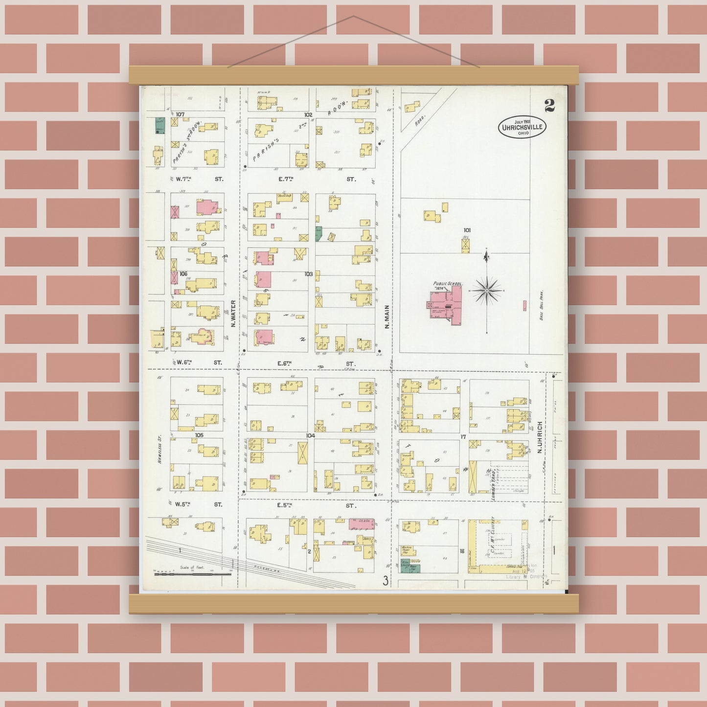 Old map wall art mockup — magnetic wood frame on brick wall — Sanborn Fire Insurance Map from Uhrichsville, Tuscarawas County, Ohio (1901), Sheet #0002