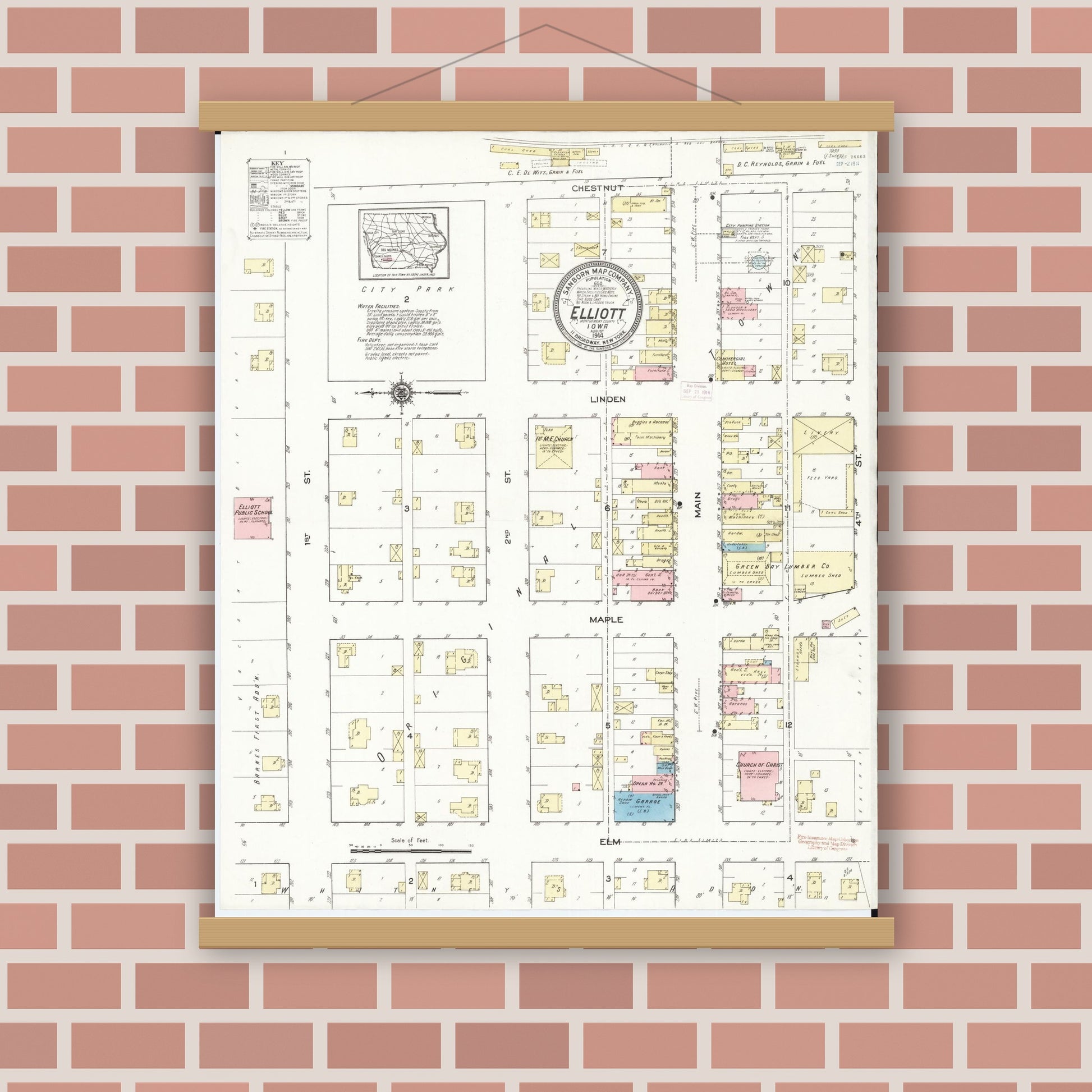 Old map wall art mockup — magnetic wood frame on brick wall — Sanborn Fire Insurance Map from Elliott, Montgomery County, Iowa (1914), Sheet #0001