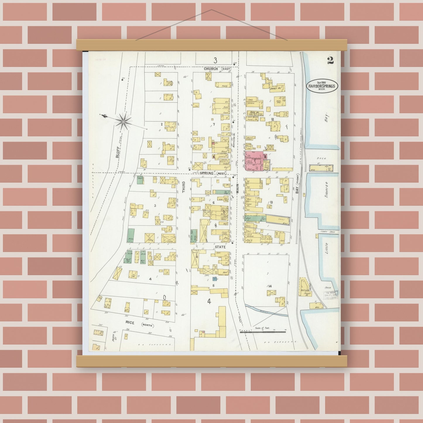 Old map wall art mockup — magnetic wood frame on brick wall — Sanborn Fire Insurance Map from Harbor Springs, Emmet County, Michigan (1900), Sheet #0002