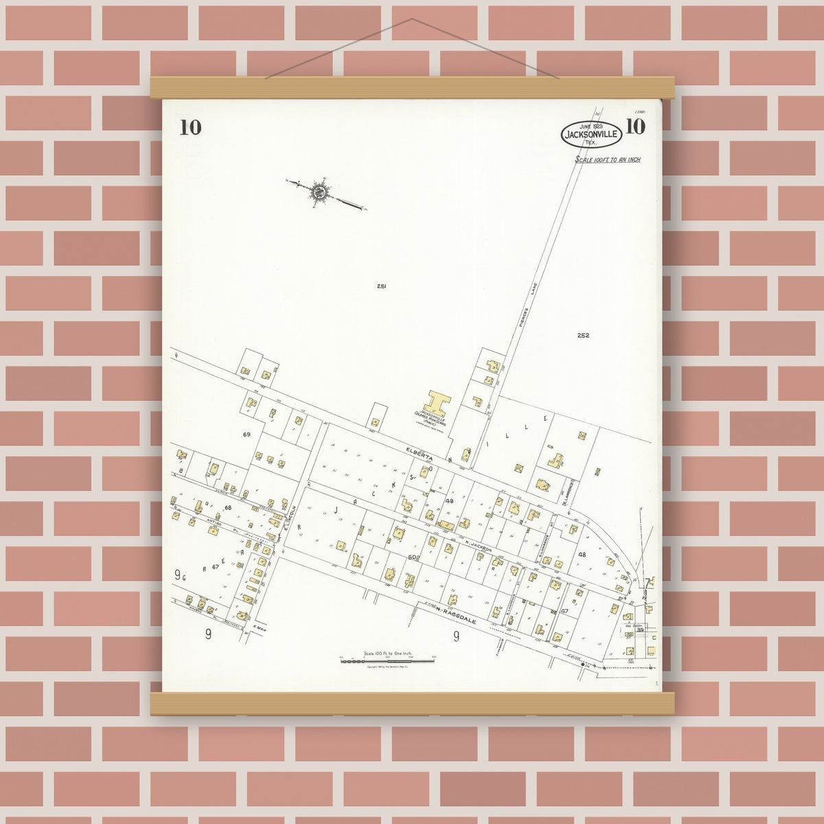 Old map wall art mockup — magnetic wood frame on brick wall — Sanborn Fire Insurance Map from Jacksonville, Cherokee County, Texas (1923), Sheet #0010
