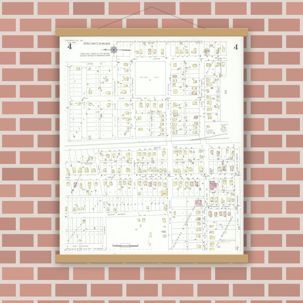 Old map wall art mockup — magnetic wood frame on brick wall — Sanborn Fire Insurance Map from Higginsville, Lafayette County, Missouri (1942), Sheet #0004