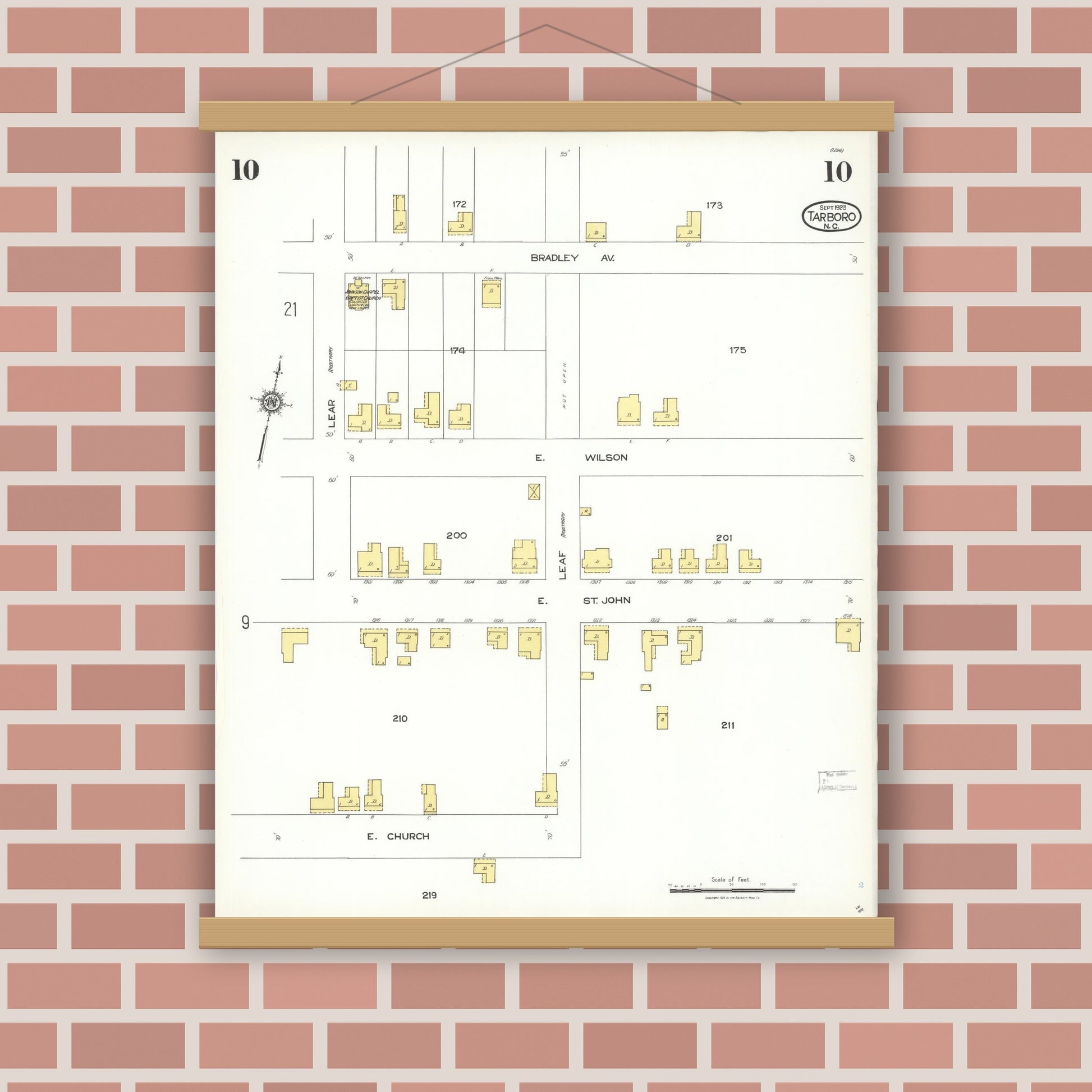 Old map wall art mockup — magnetic wood frame on brick wall — Sanborn Fire Insurance Map from Tarboro, Edgecombe County, North Carolina (1923), Sheet #0010