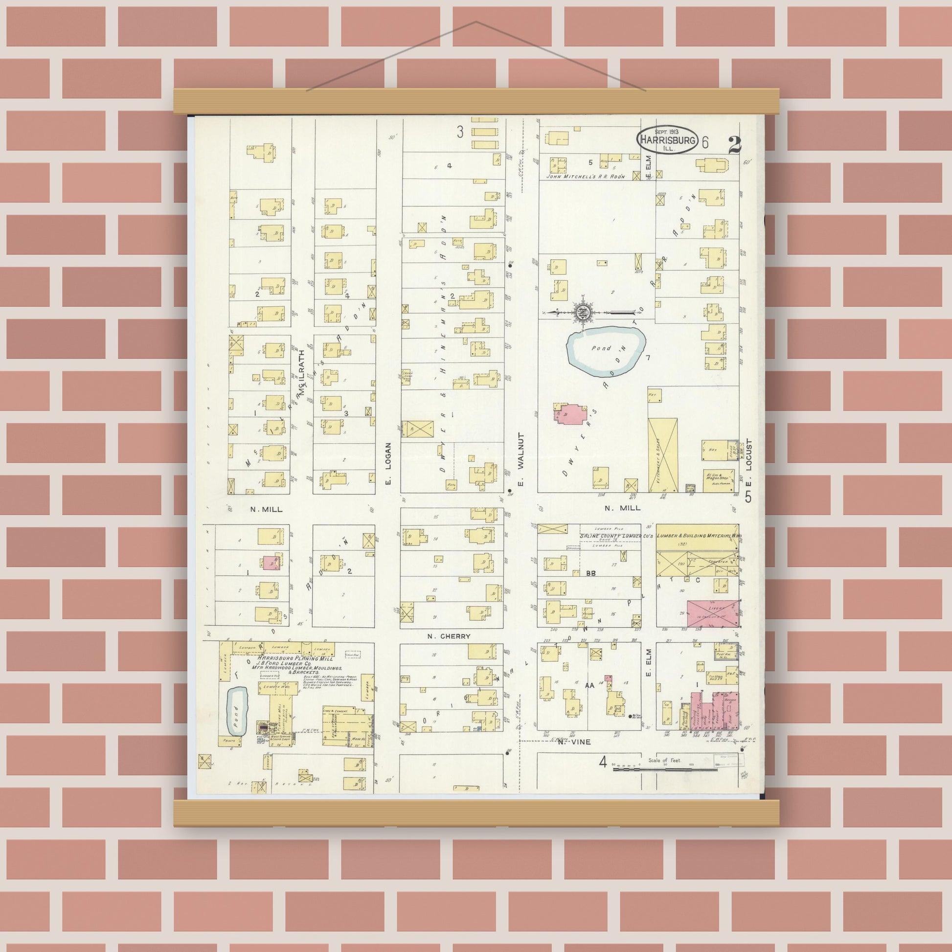 Old map wall art mockup — magnetic wood frame on brick wall — Sanborn Fire Insurance Map from Harrisburg, Saline County, Illinois (1913), Sheet #0002