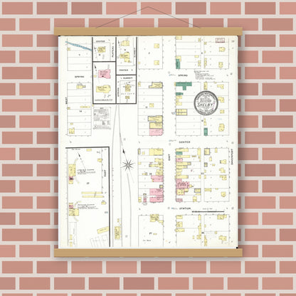 Old map wall art mockup — magnetic wood frame on brick wall — Sanborn Fire Insurance Map from Shelby, Shelby County, Iowa (1909), Sheet #0001