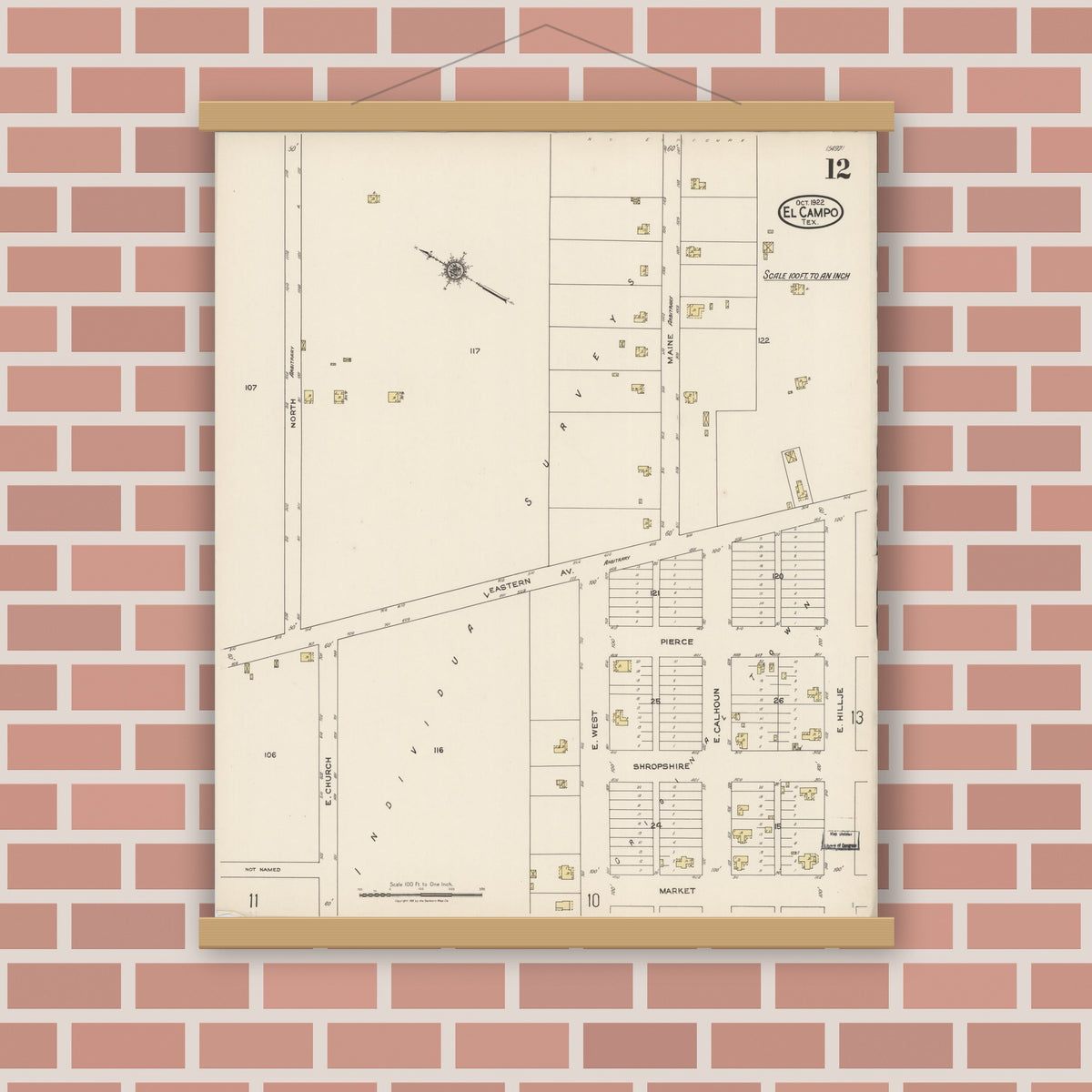 Old map wall art mockup — magnetic wood frame on brick wall — Sanborn Fire Insurance Map from El Campo, Wharton County, Texas (1922), Sheet #0012