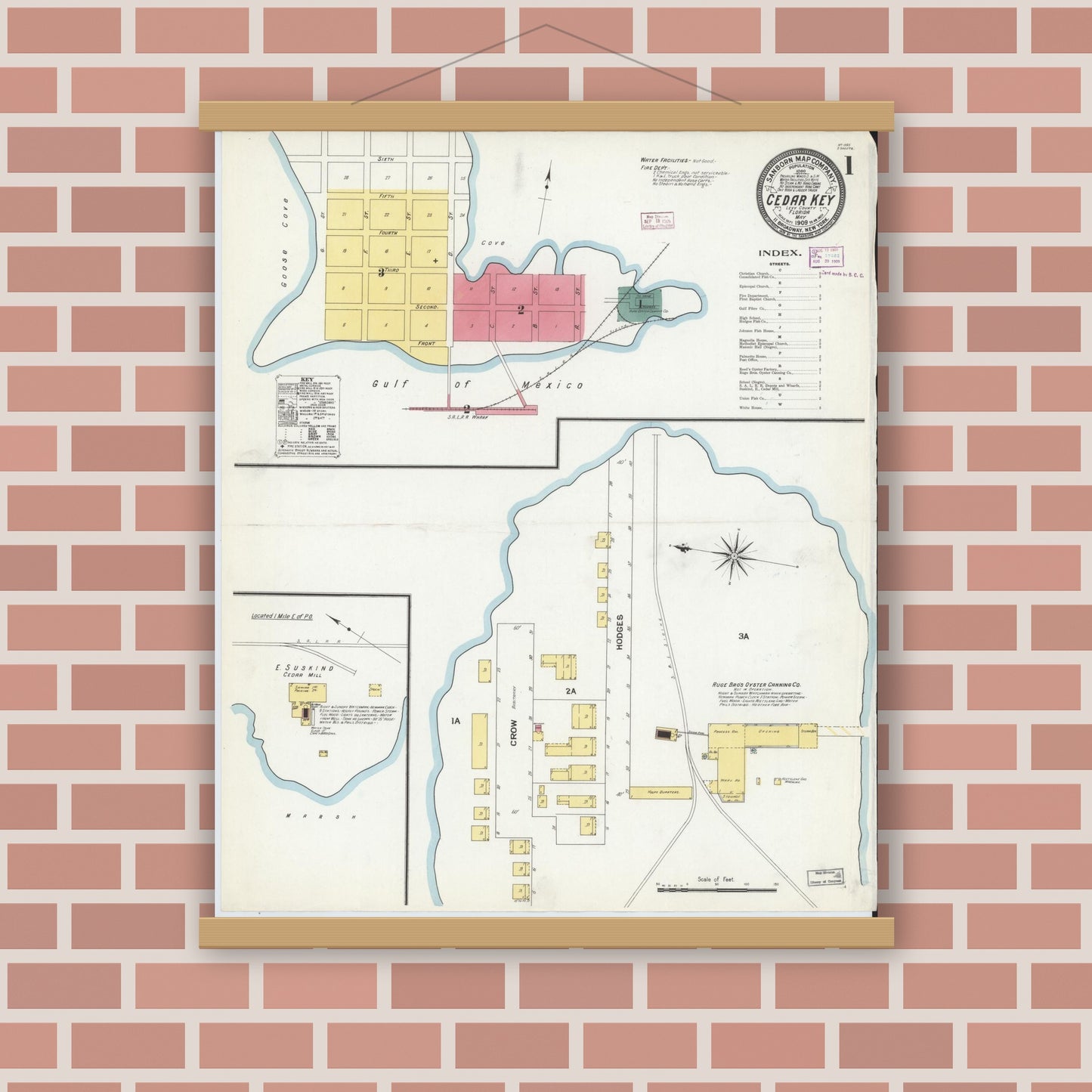 Old map wall art mockup — magnetic wood frame on brick wall — Sanborn Fire Insurance Map from Cedar Key, Levy County, Florida (1909) - Complete Map Set