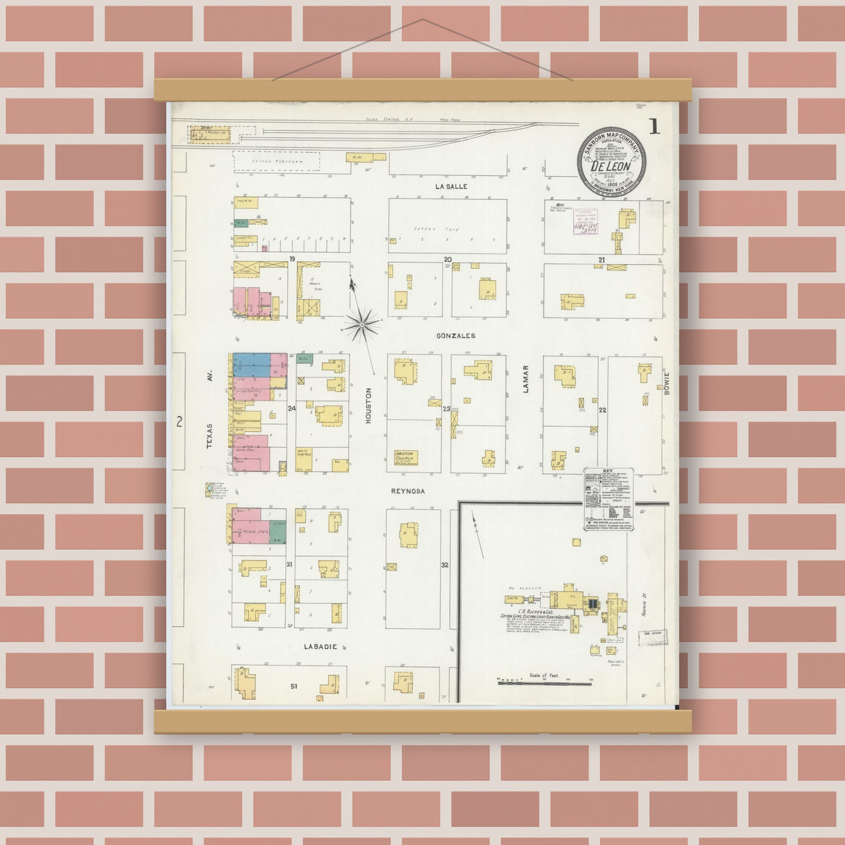 Old map wall art mockup — magnetic wood frame on brick wall — Sanborn Fire Insurance Map from De Leon, Comanche County, Texas (1905), Sheet #0001