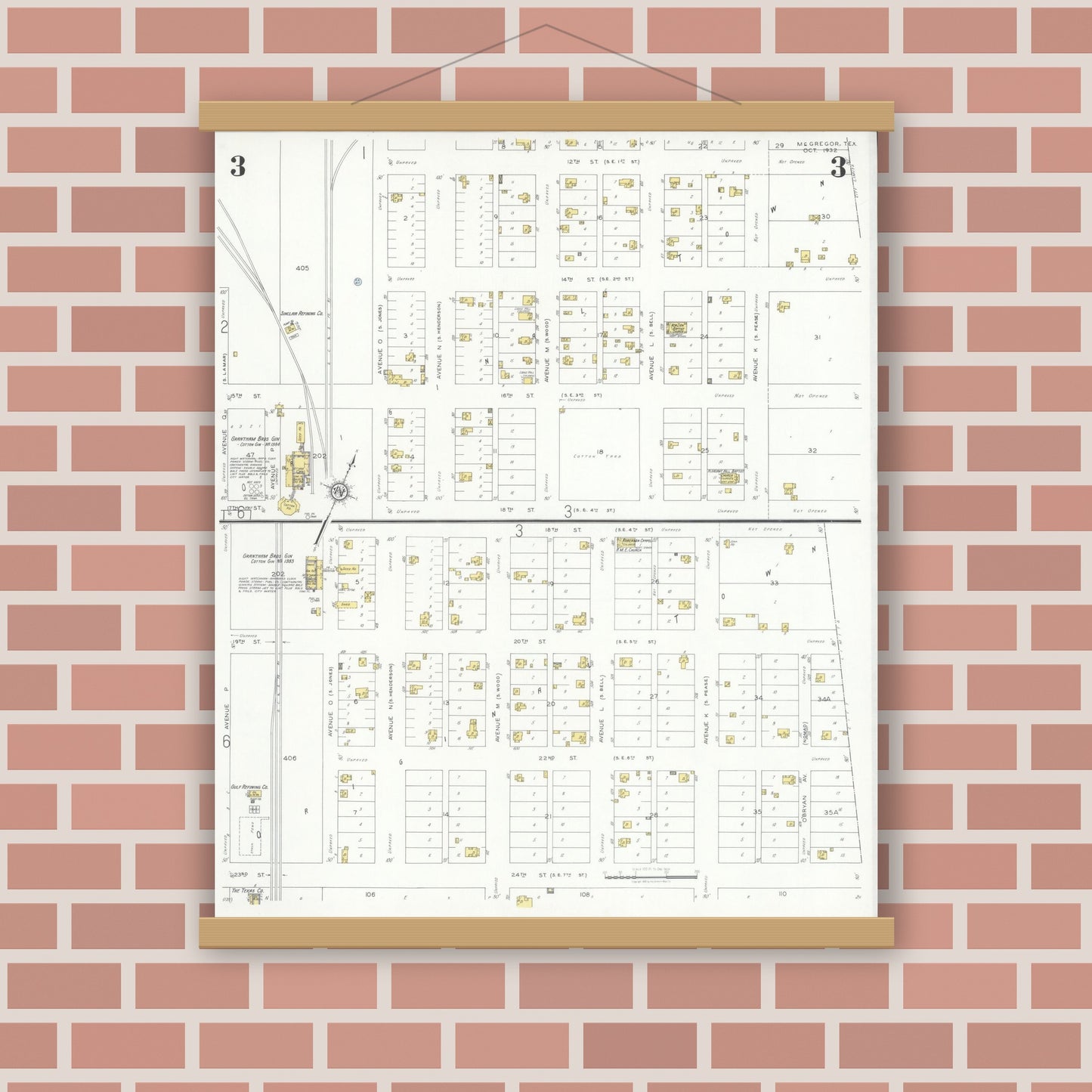 Old map wall art mockup — magnetic wood frame on brick wall — Sanborn Fire Insurance Map from McGregor, McLennan County, Texas (1932), Sheet #0003