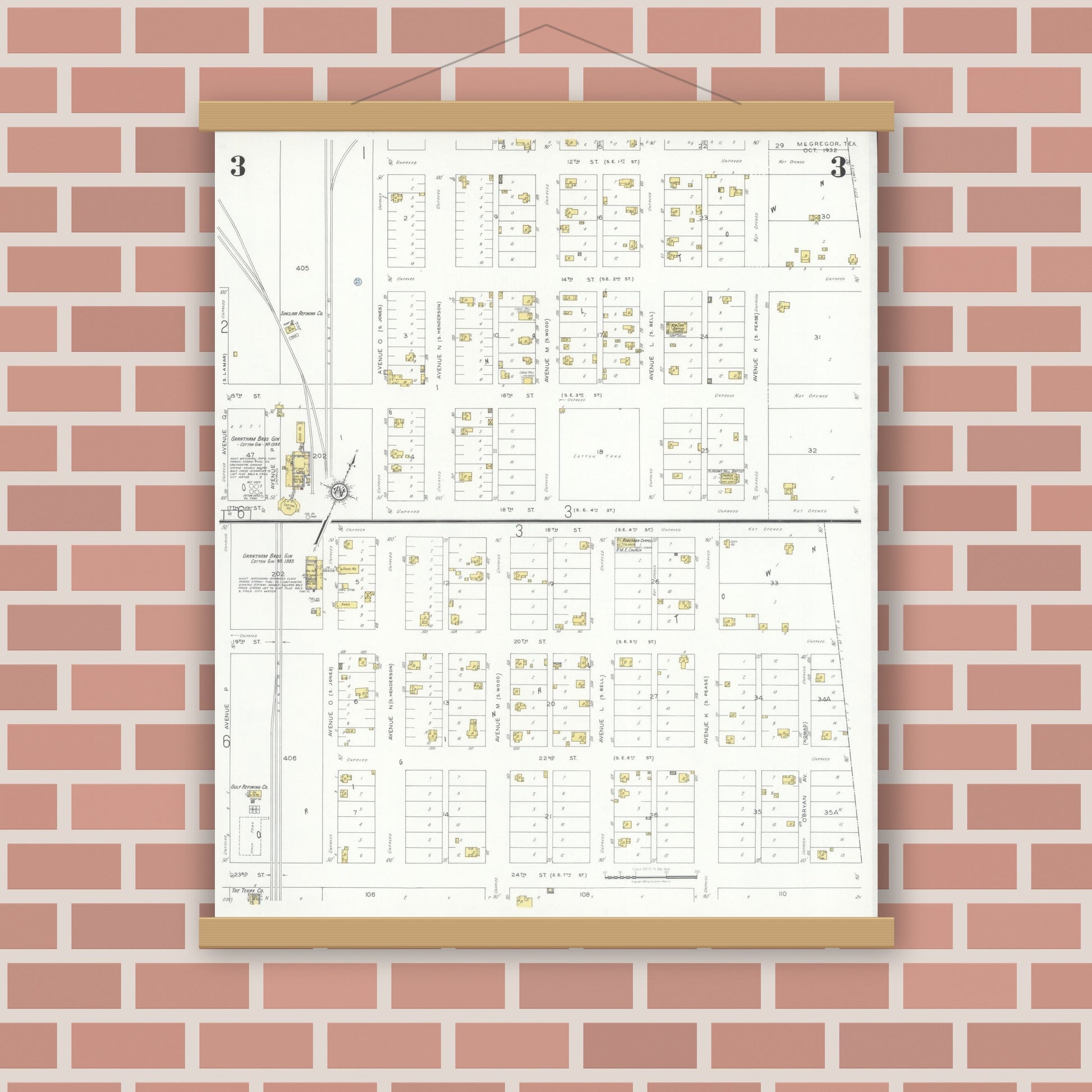 Old map wall art mockup — magnetic wood frame on brick wall — Sanborn Fire Insurance Map from McGregor, McLennan County, Texas (1932), Sheet #0003