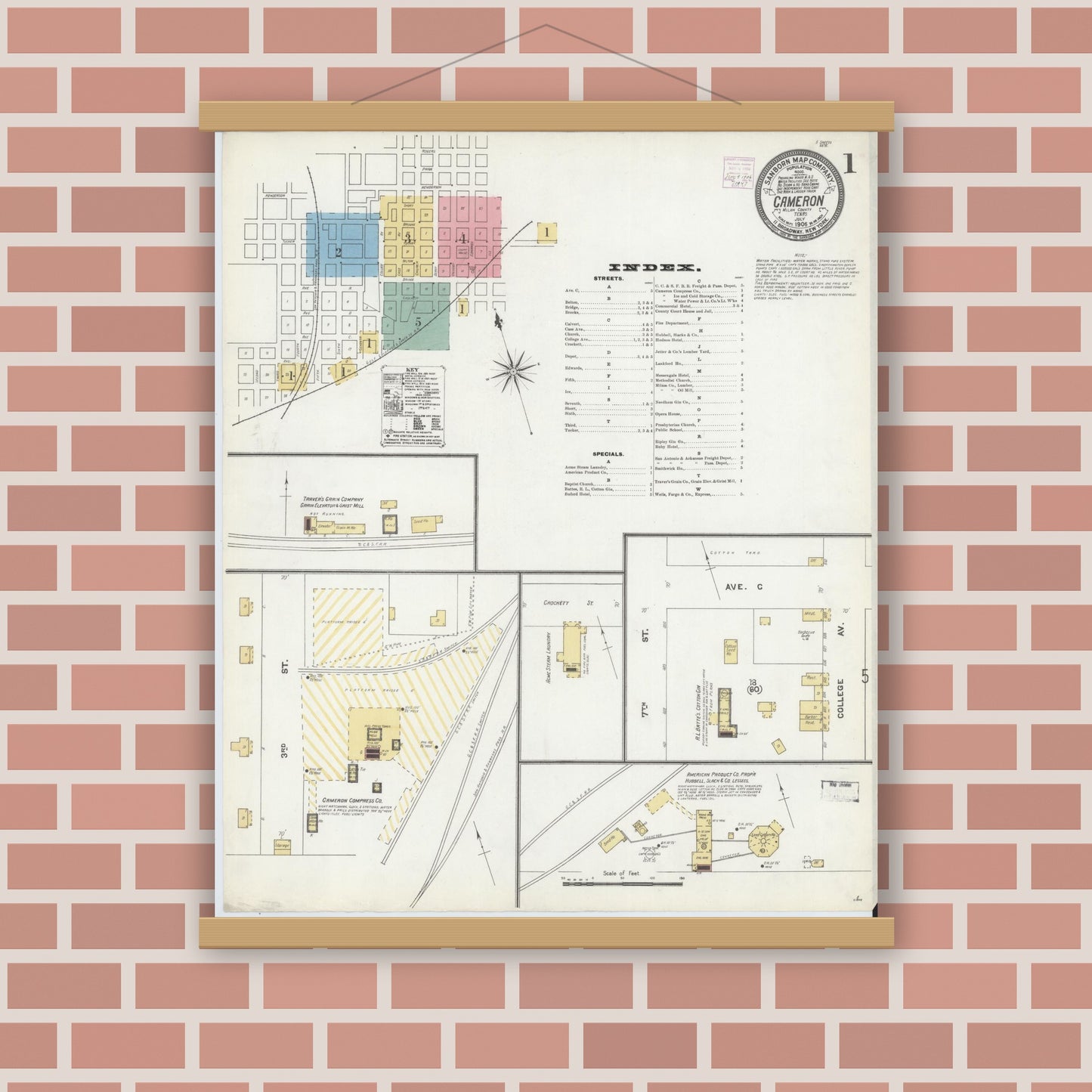 Old map wall art mockup — magnetic wood frame on brick wall — Sanborn Fire Insurance Map from Cameron, Milam County, Texas (1906), Sheet #0001
