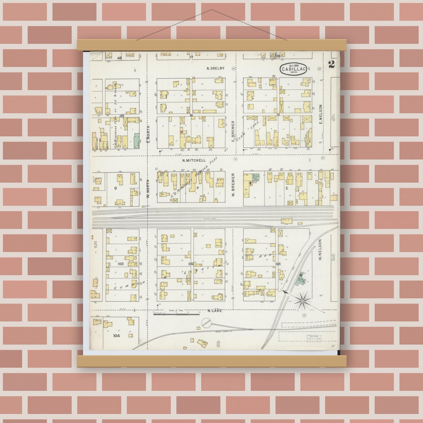 Old map wall art mockup — magnetic wood frame on brick wall — Sanborn Fire Insurance Map from Cadillac, Wexford County, Michigan (1895), Sheet #0002