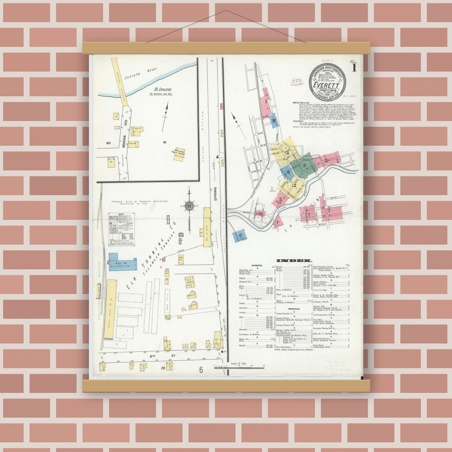Old map wall art mockup — magnetic wood frame on brick wall — Sanborn Fire Insurance Map from Everett, Bedford County, Pennsylvania (1910), Sheet #0001