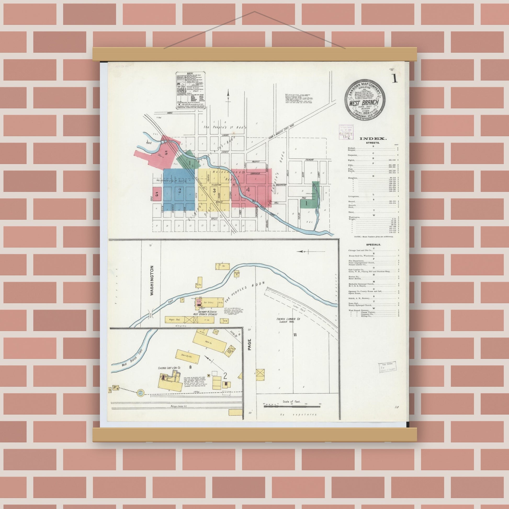 Old map wall art mockup — magnetic wood frame on brick wall — Sanborn Fire Insurance Map from West Branch, Ogemaw County, Michigan (1904), Sheet #0001