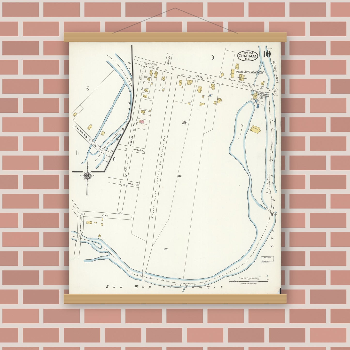 Old map wall art mockup — magnetic wood frame on brick wall — Sanborn Fire Insurance Map from Chatham, Morris County, New Jersey (1921), Sheet #0010