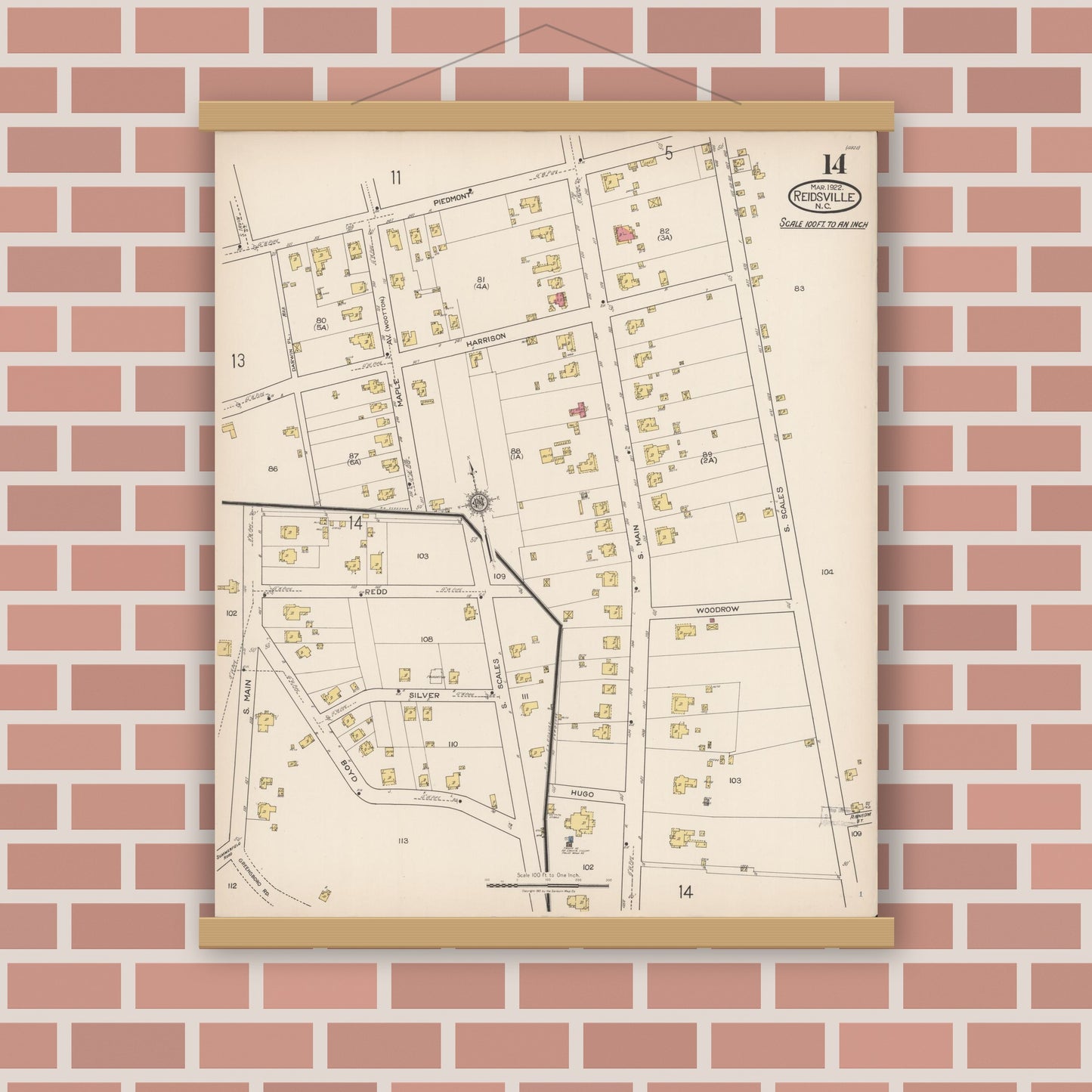 Old map wall art mockup — magnetic wood frame on brick wall — Sanborn Fire Insurance Map from Reidsville, Rockingham County, North Carolina (1922), Sheet #0014