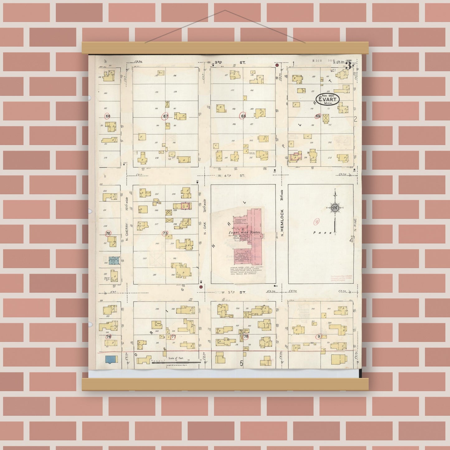 Old map wall art mockup — magnetic wood frame on brick wall — Sanborn Fire Insurance Map from Evart, Osceola County, Michigan (1942), Sheet #0003