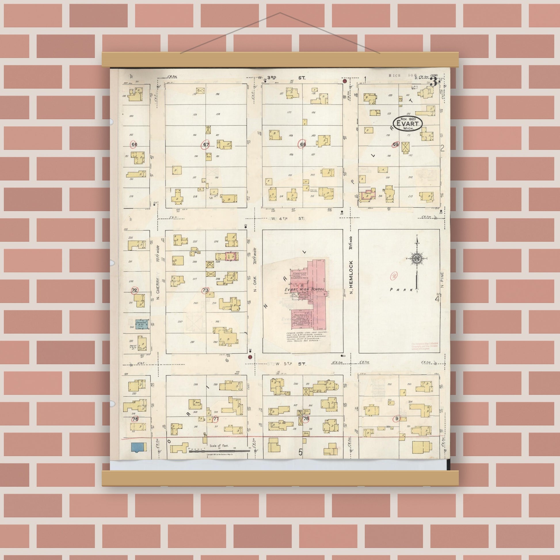Old map wall art mockup — magnetic wood frame on brick wall — Sanborn Fire Insurance Map from Evart, Osceola County, Michigan (1942), Sheet #0003