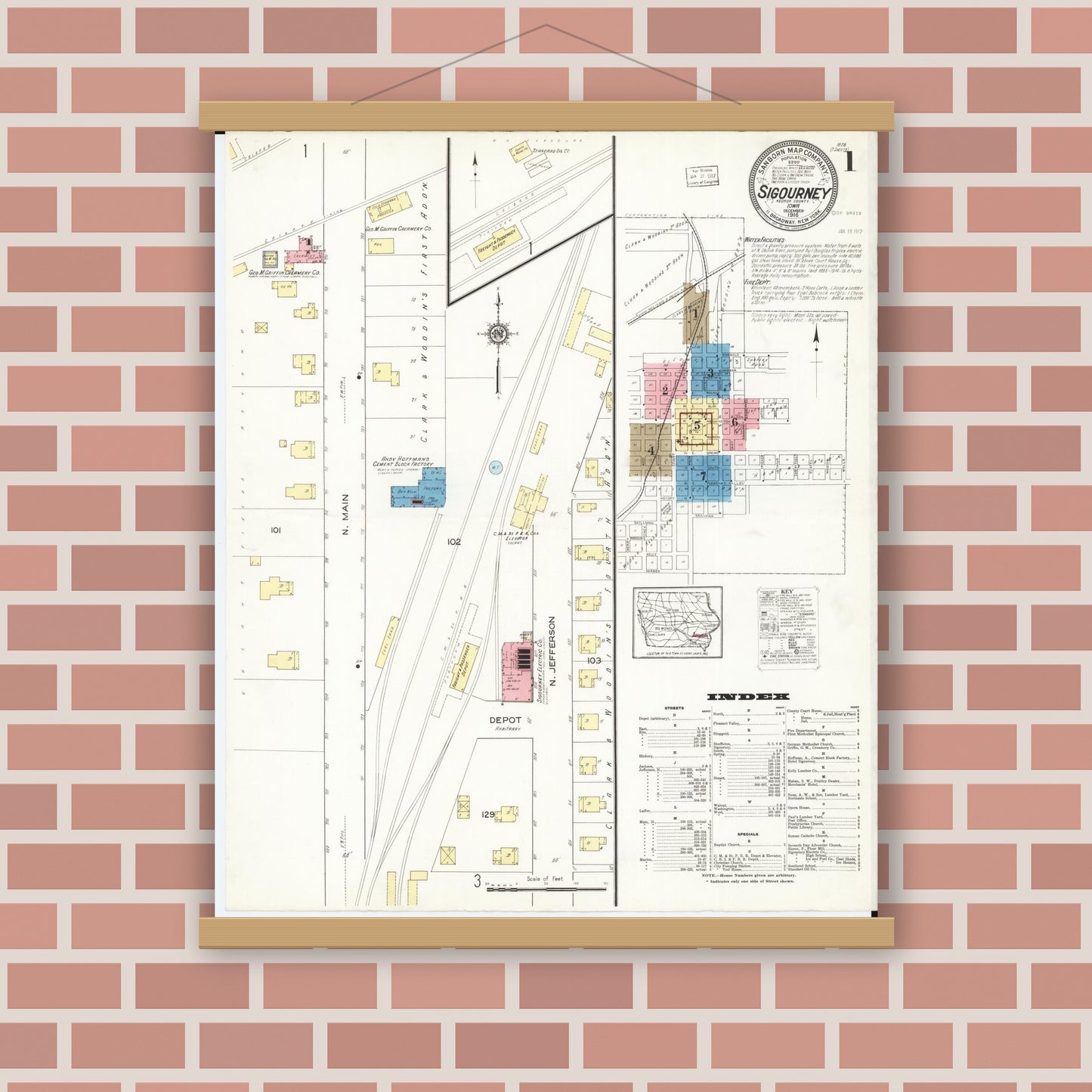 Old map wall art mockup — magnetic wood frame on brick wall — Sanborn Fire Insurance Map from Sigourney, Kiokuk County, Iowa (1916) â€” Complete Set